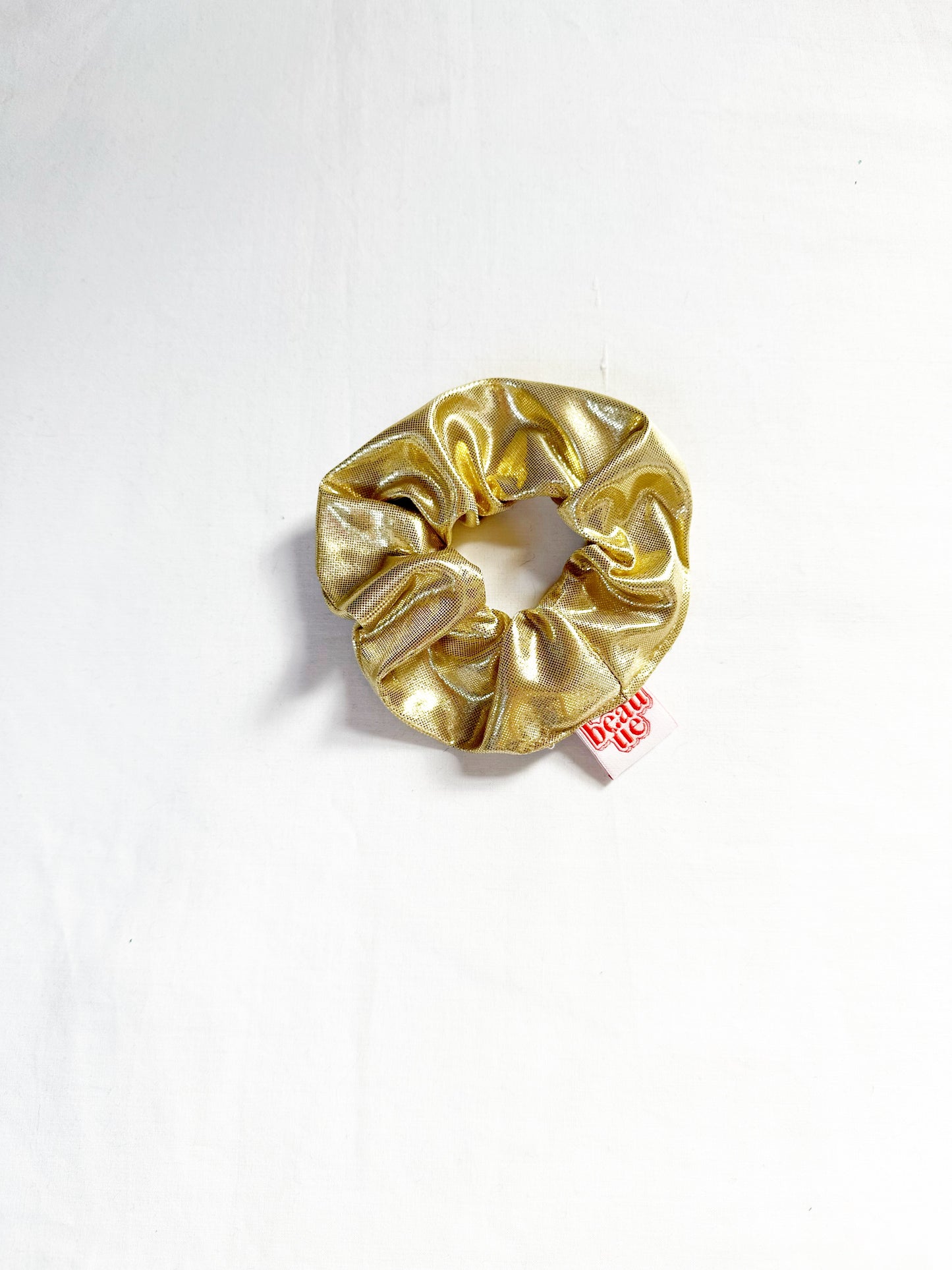 Mini scrunchie in gold lamé