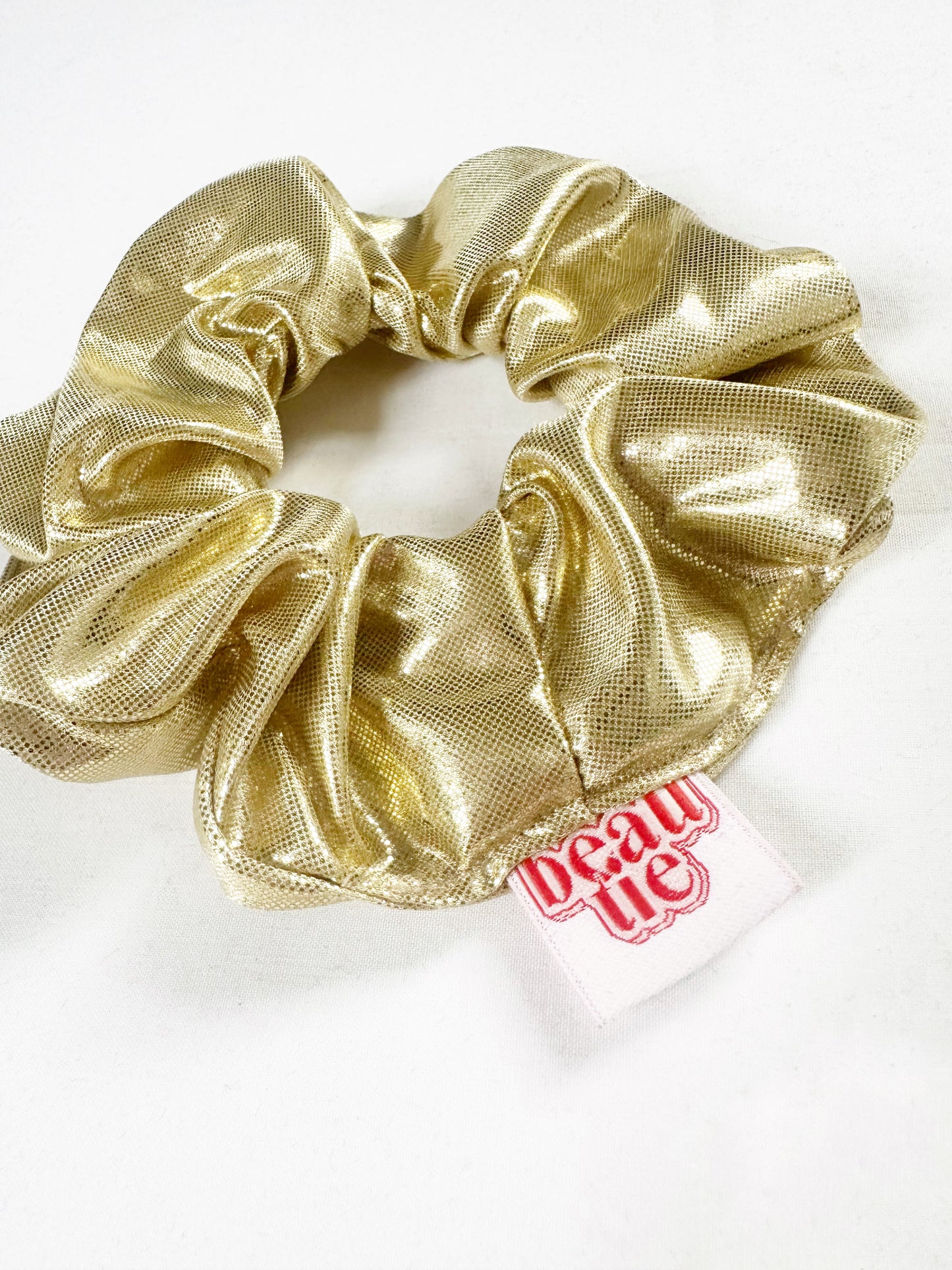 OG scrunchie in gold shimmer