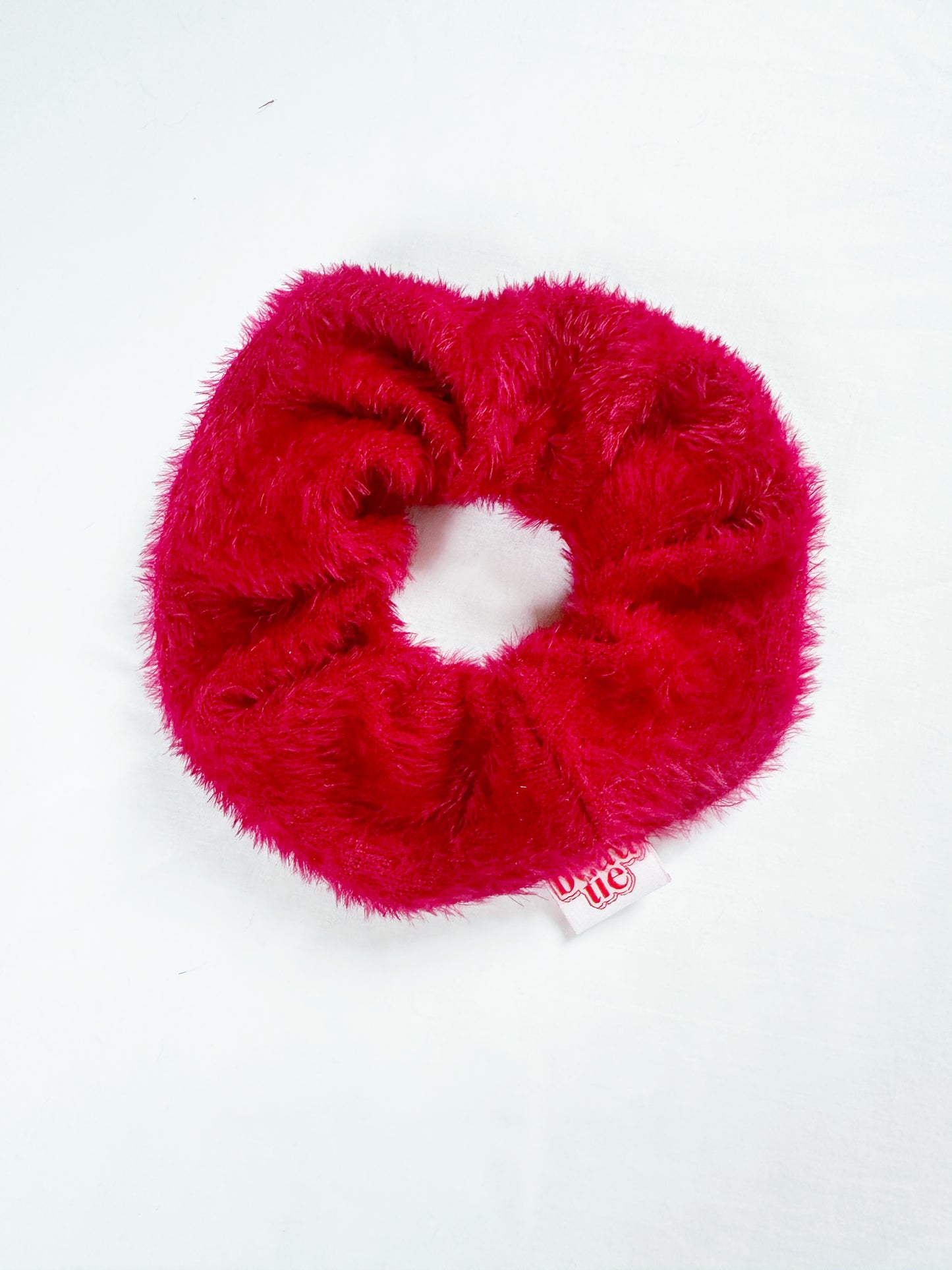 OG scrunchie in red fluff