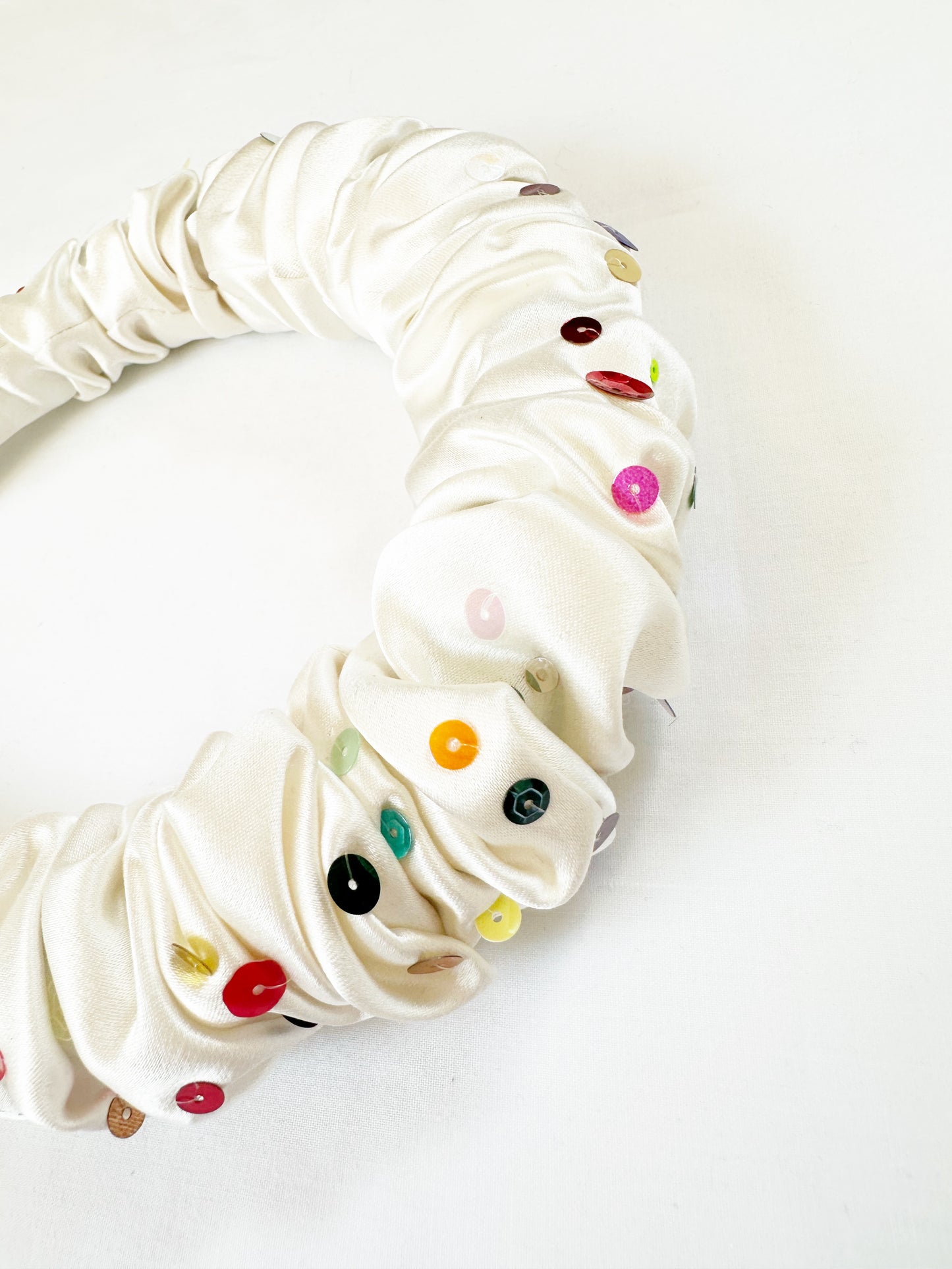 The Confetti - Ruffle Headband in ivory silk with mixed colour sequins