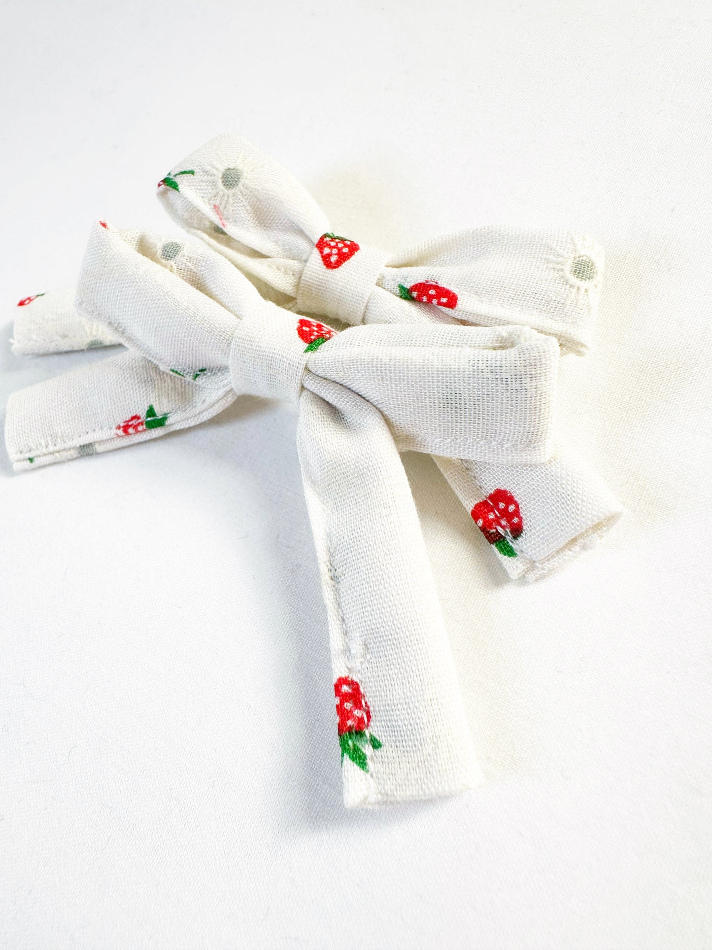 Bonnie mini hair bows in strawberry print