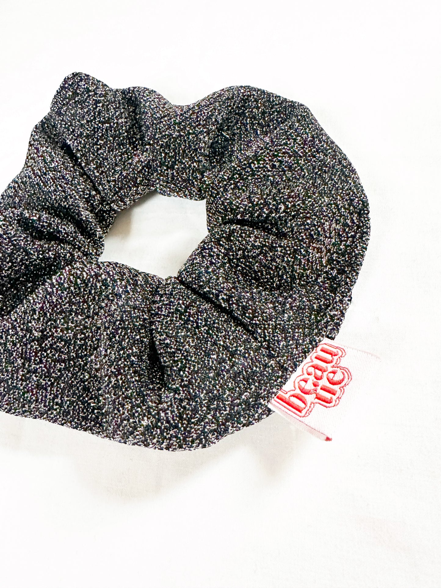 OG scrunchie in silver glitter