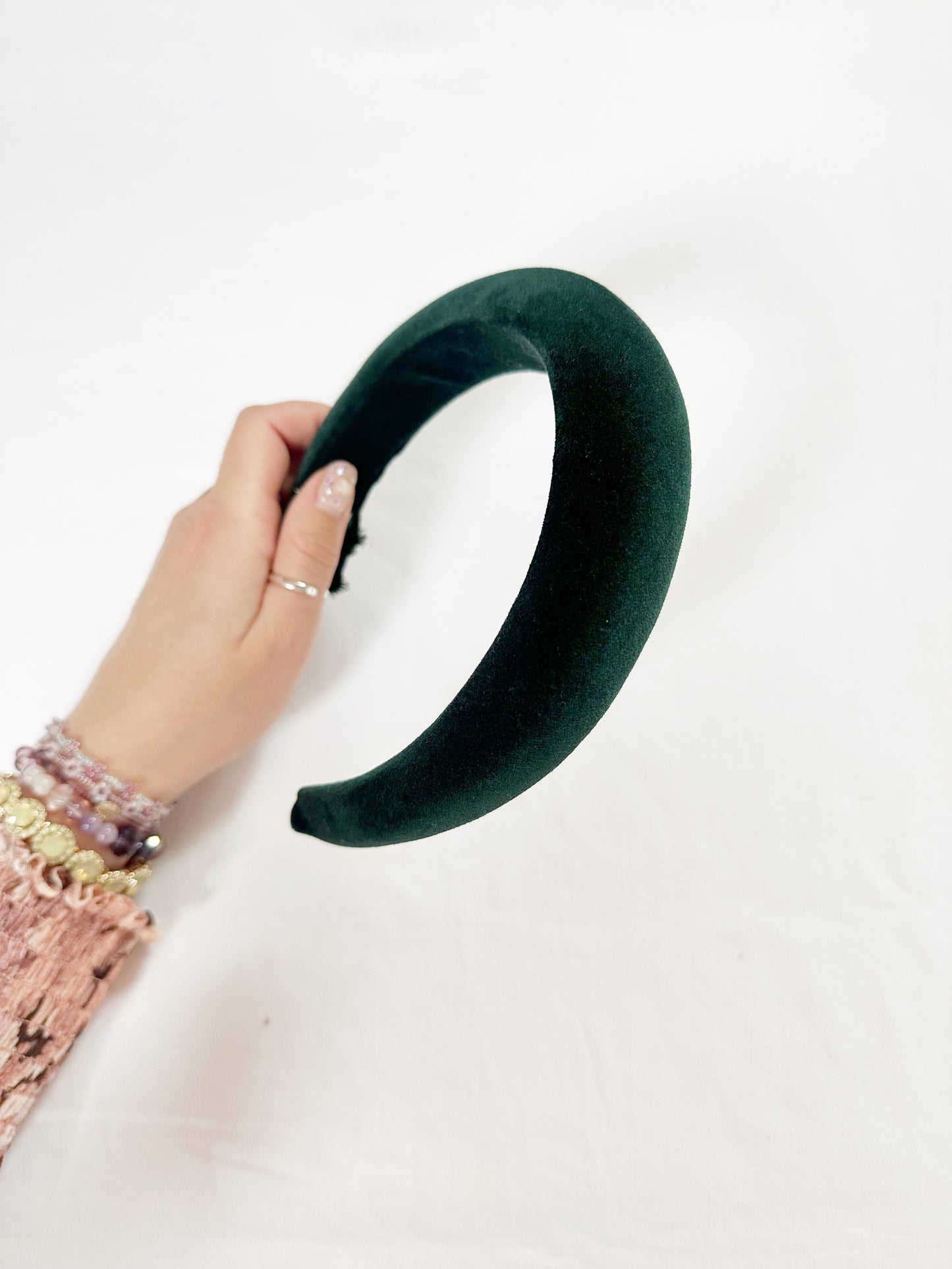 Padded headband in hunter green velvet