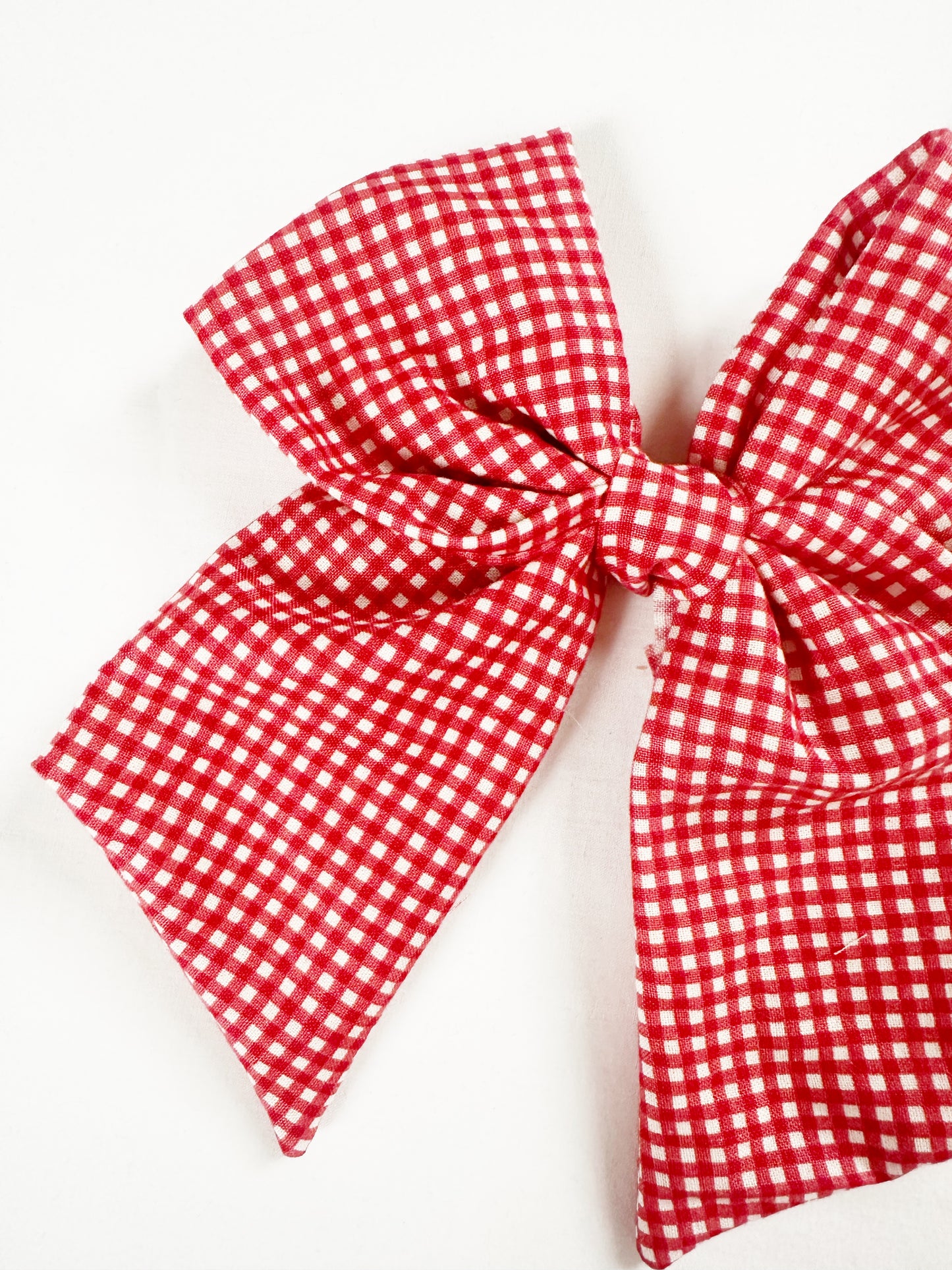 Beau hair bow in red & white gingham cotton