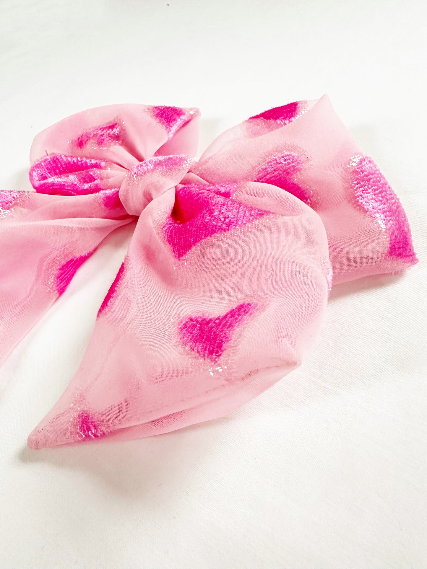 Beau hair bow in sheer pink heart