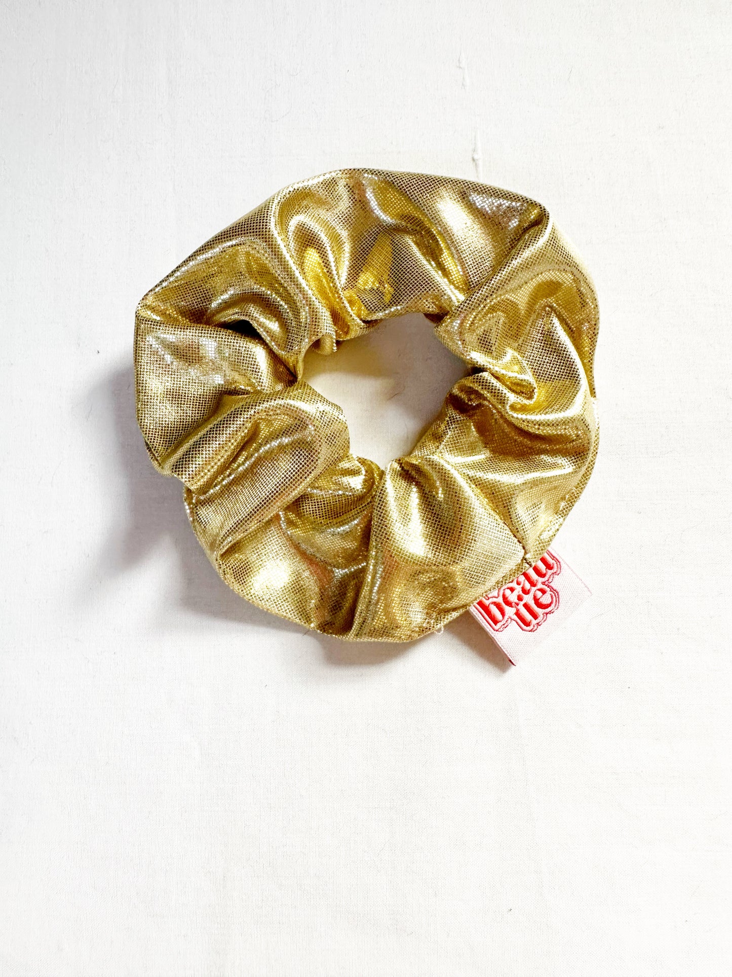 Mini scrunchie in gold lamé