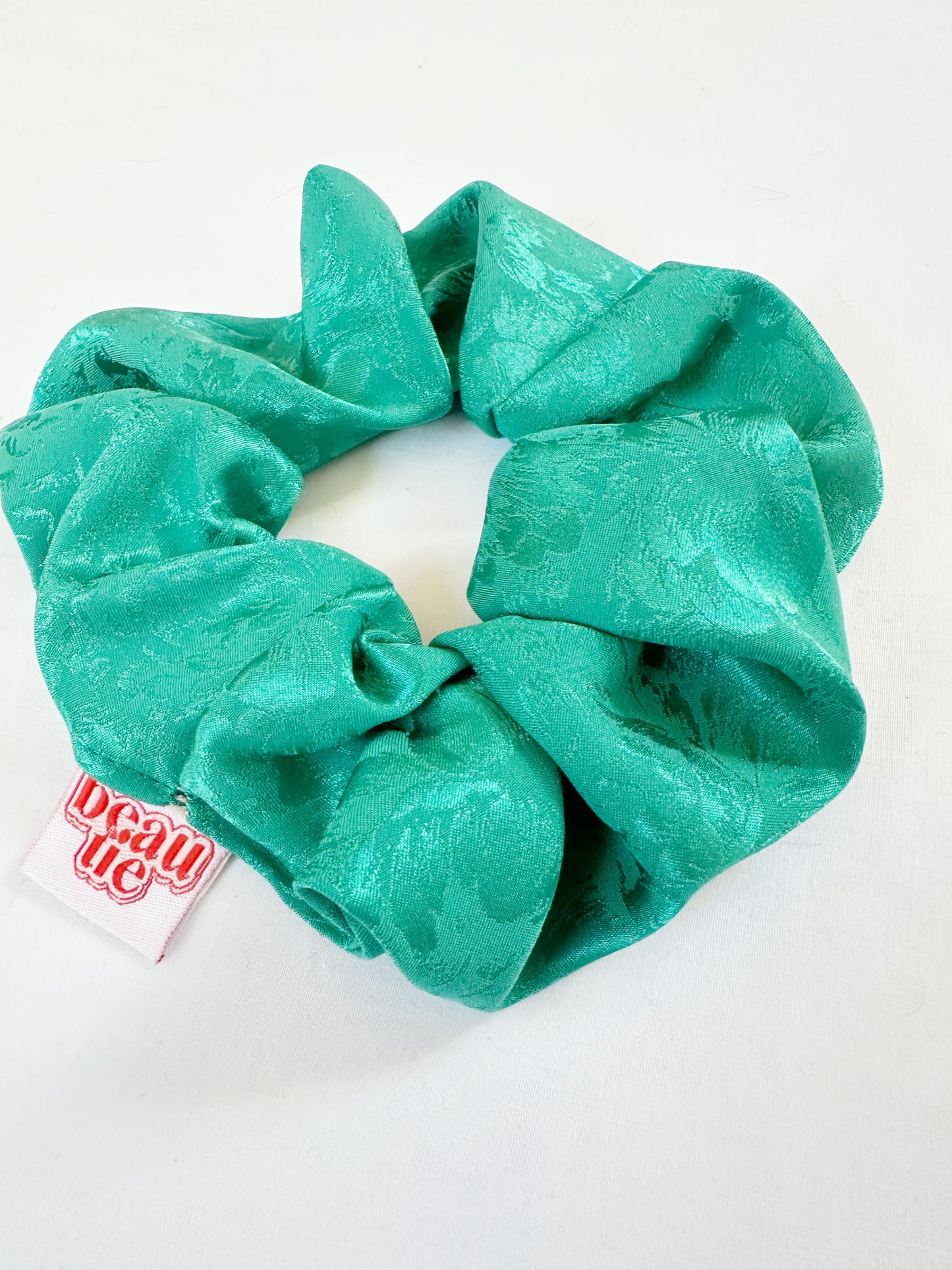 OG scrunchie in turquoise silky floral