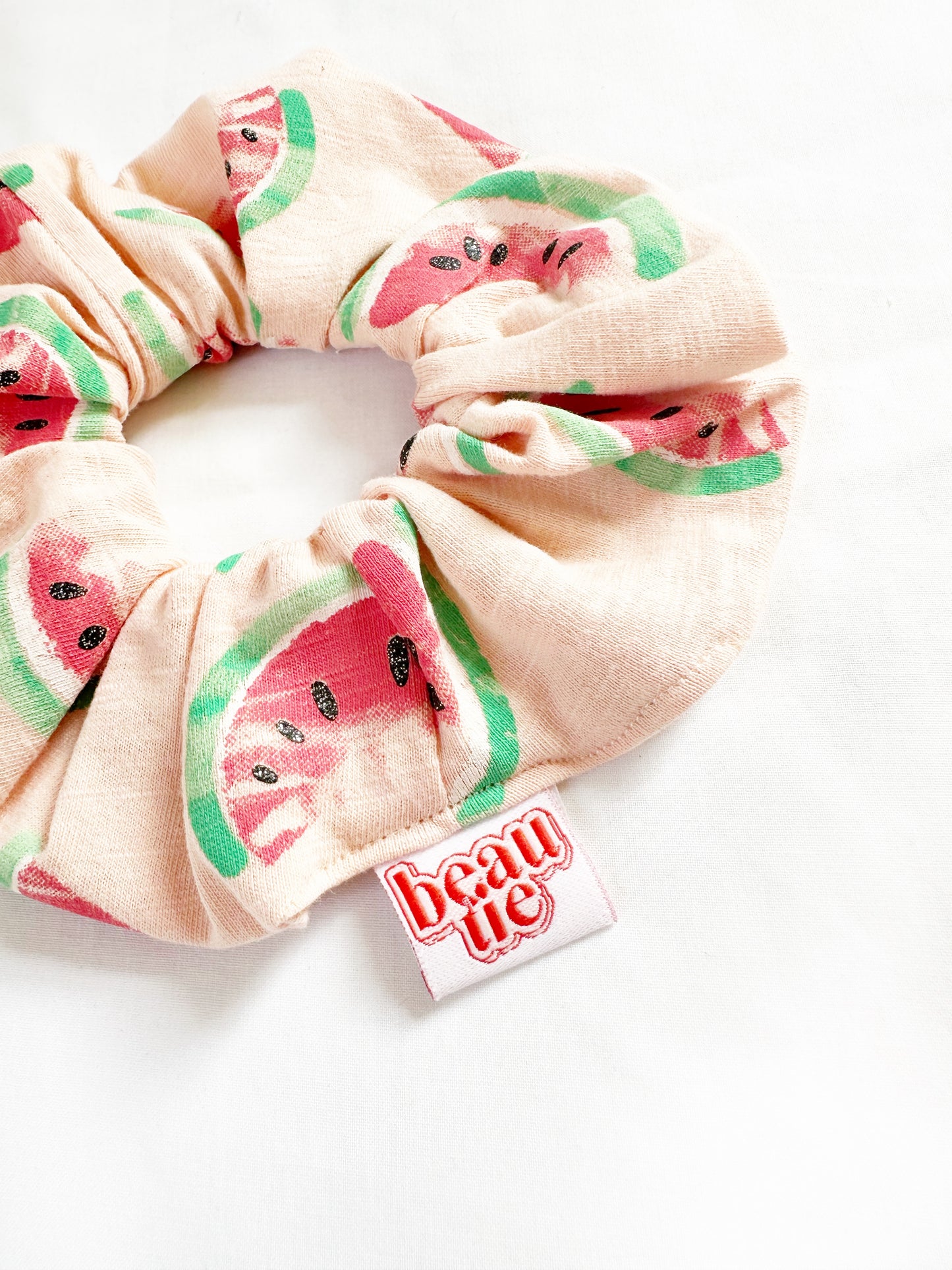 The OG scrunchie in sparkly watermelon