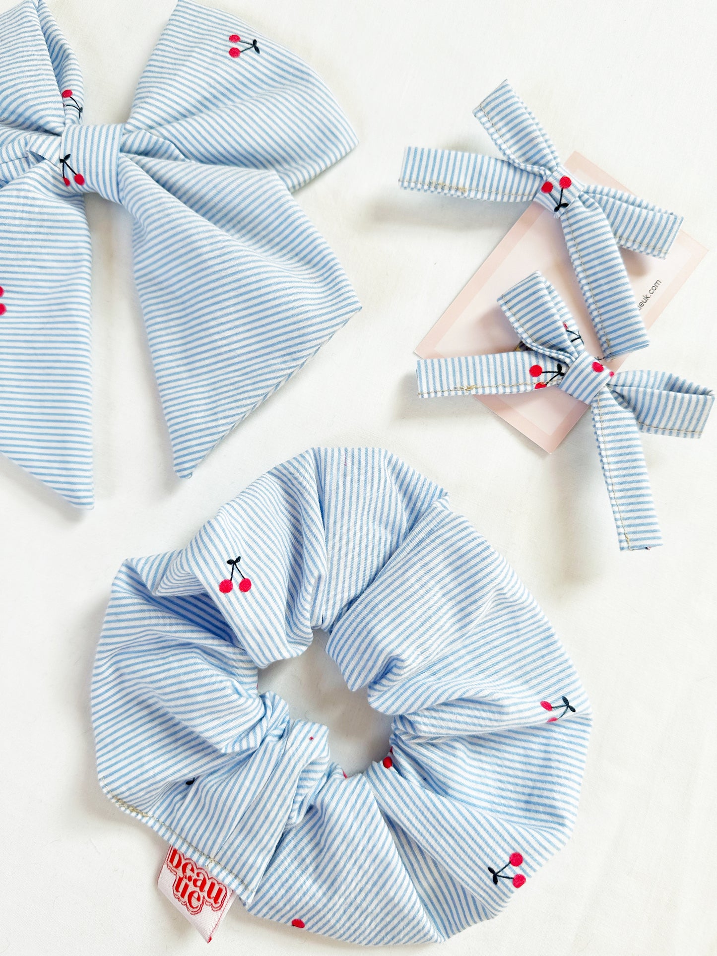 Beau hair bow in cherry print