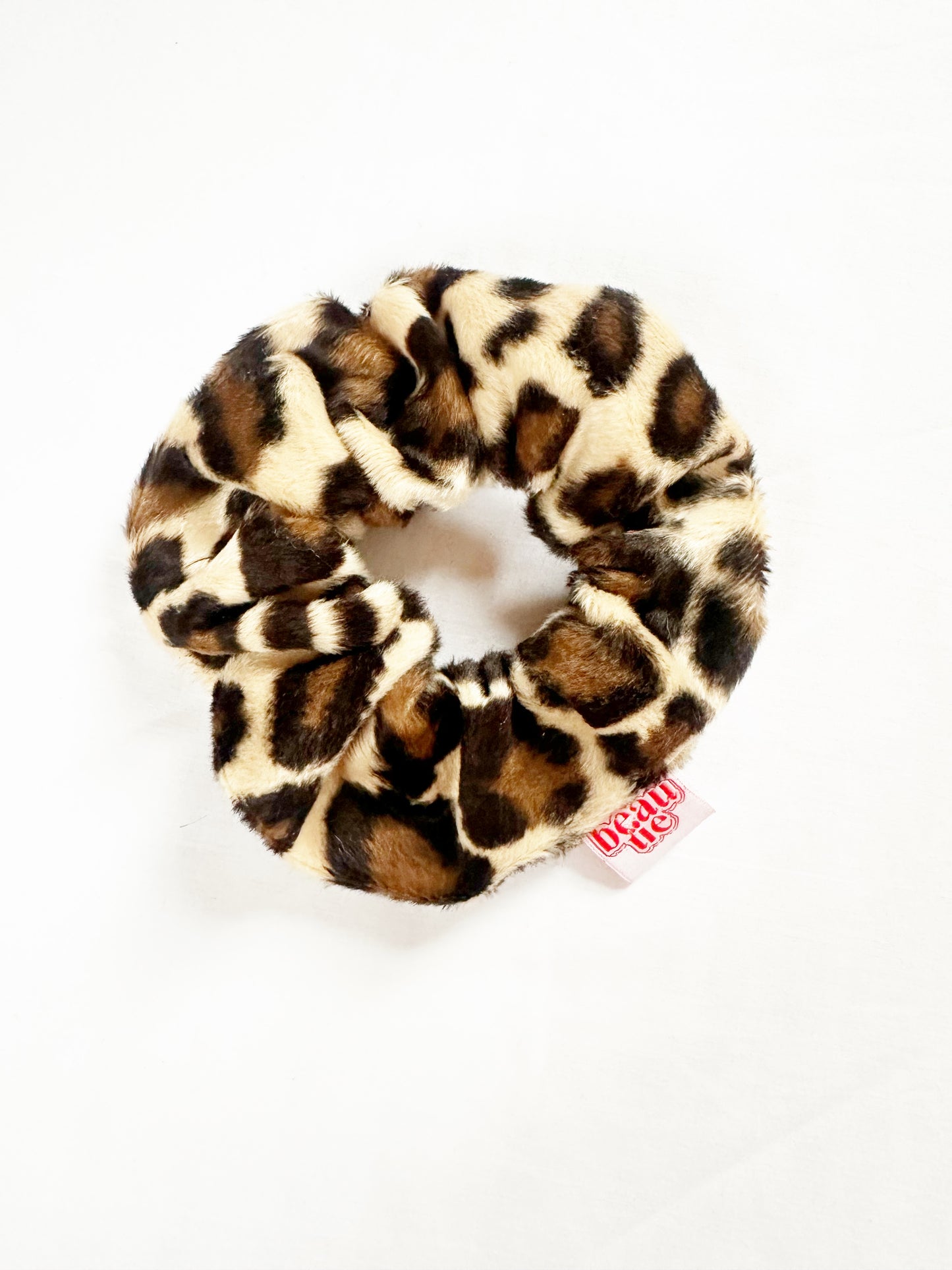 OG scrunchie in leopard faux fur