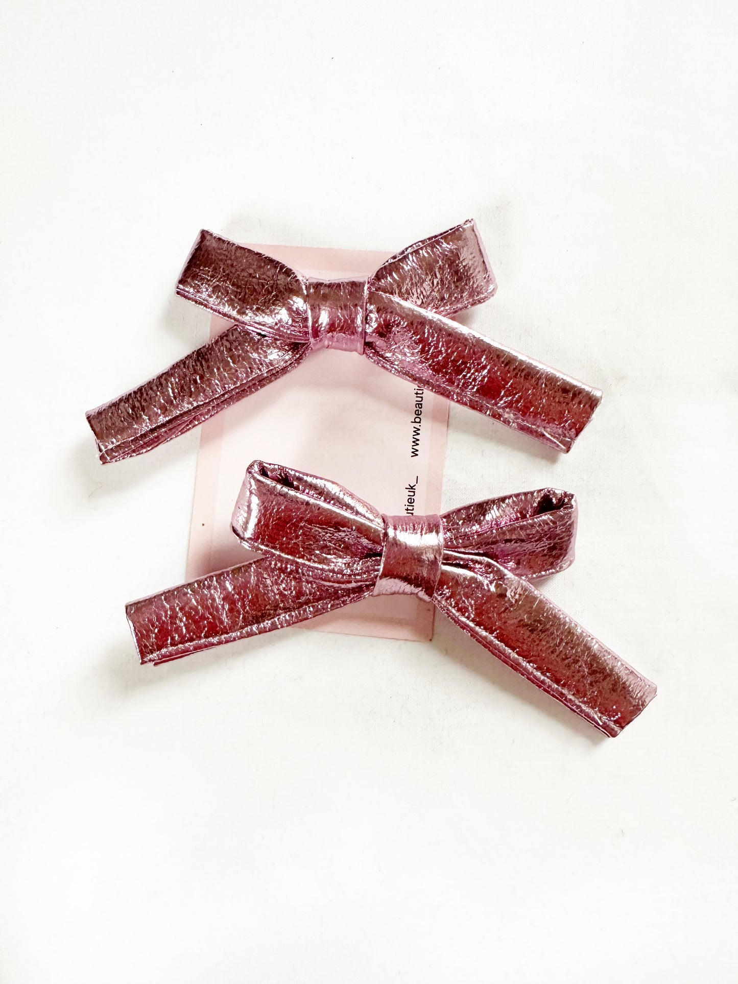 Bonnie mini hair bows in metallic pink