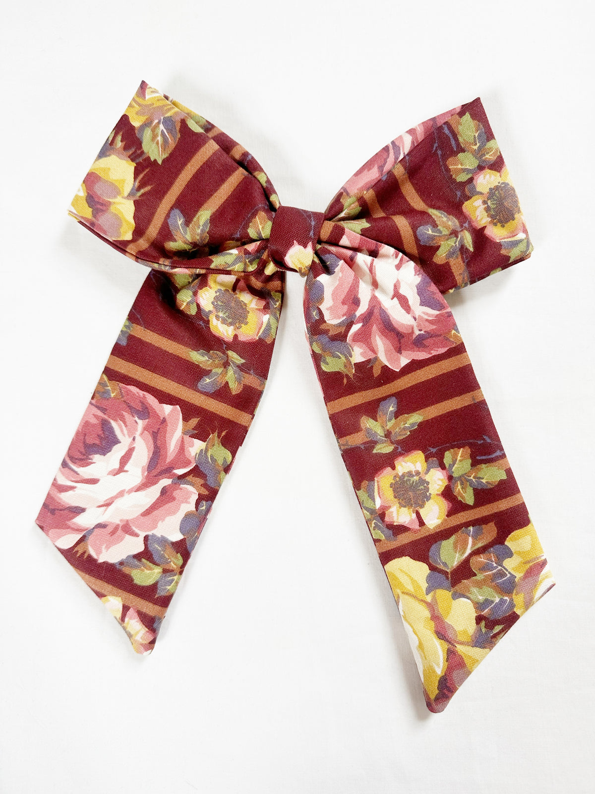 The Power Hair Bow in burgundy vintage floral