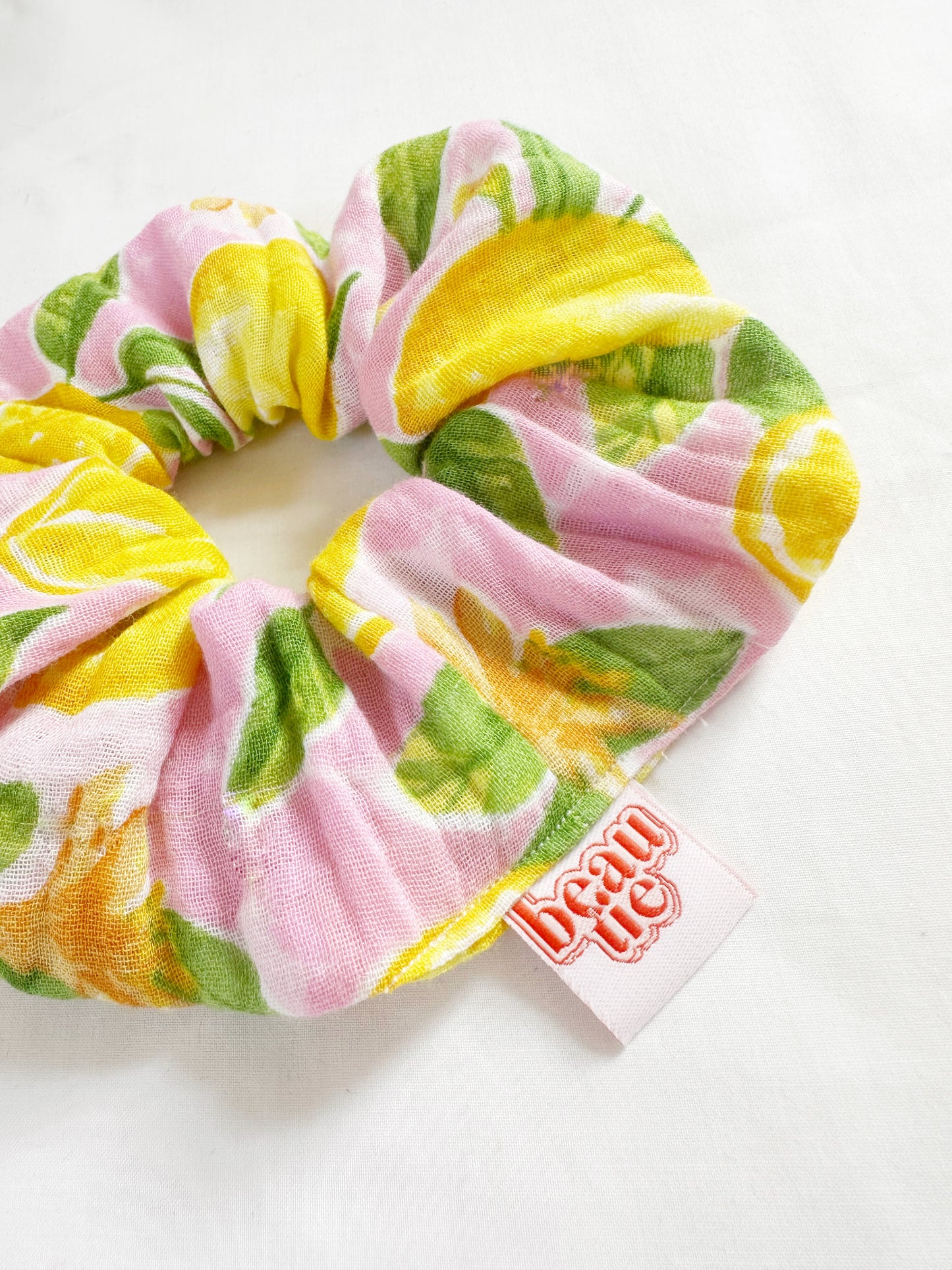 The OG scrunchie in leafy lemon