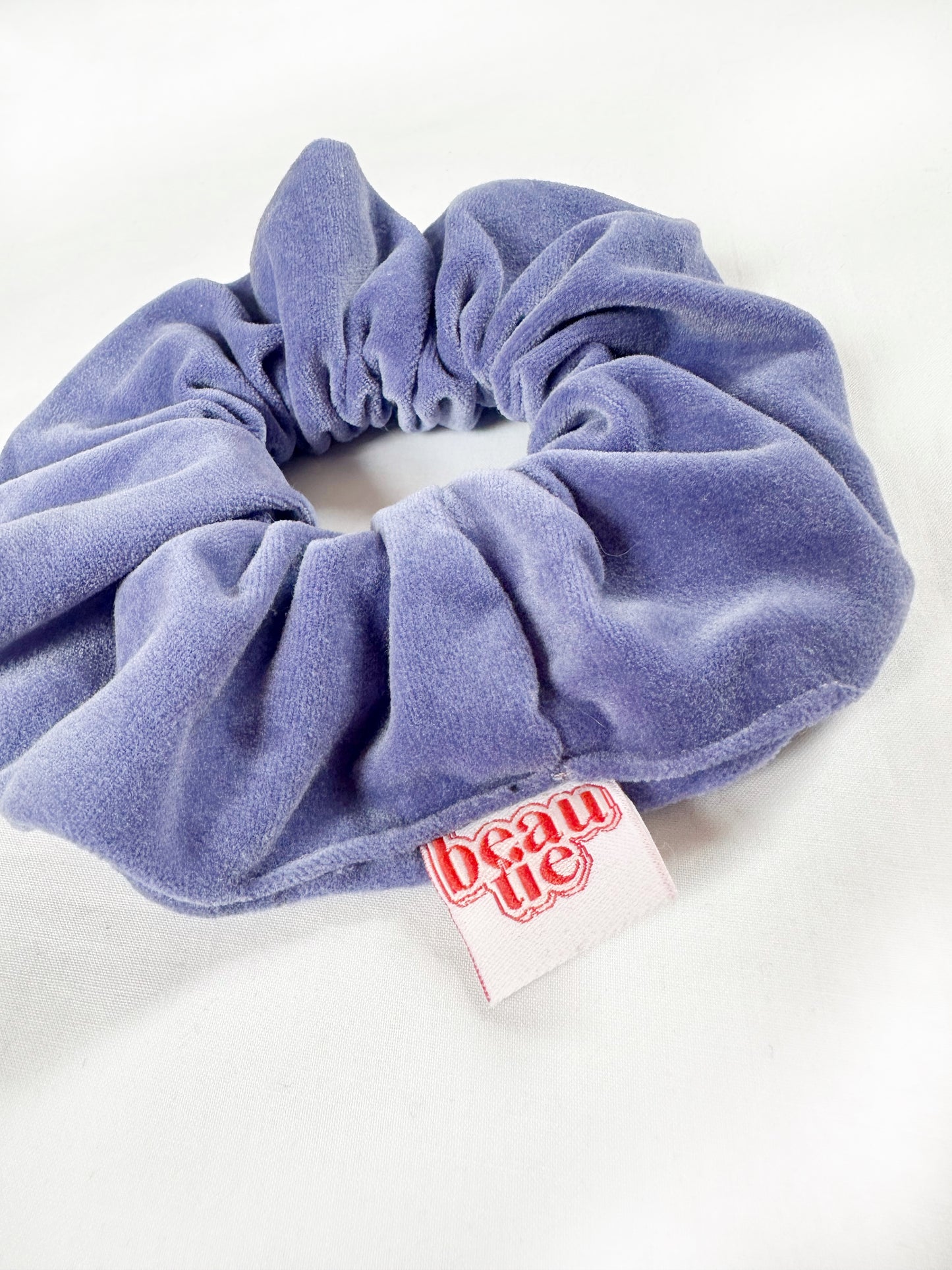 OG scrunchie in periwinkle purple velvet