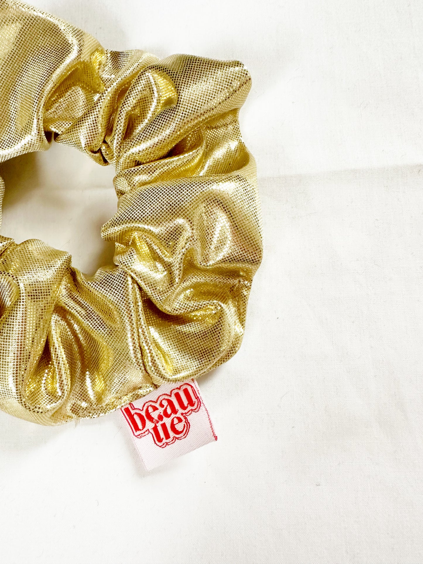 OG scrunchie in gold lamé