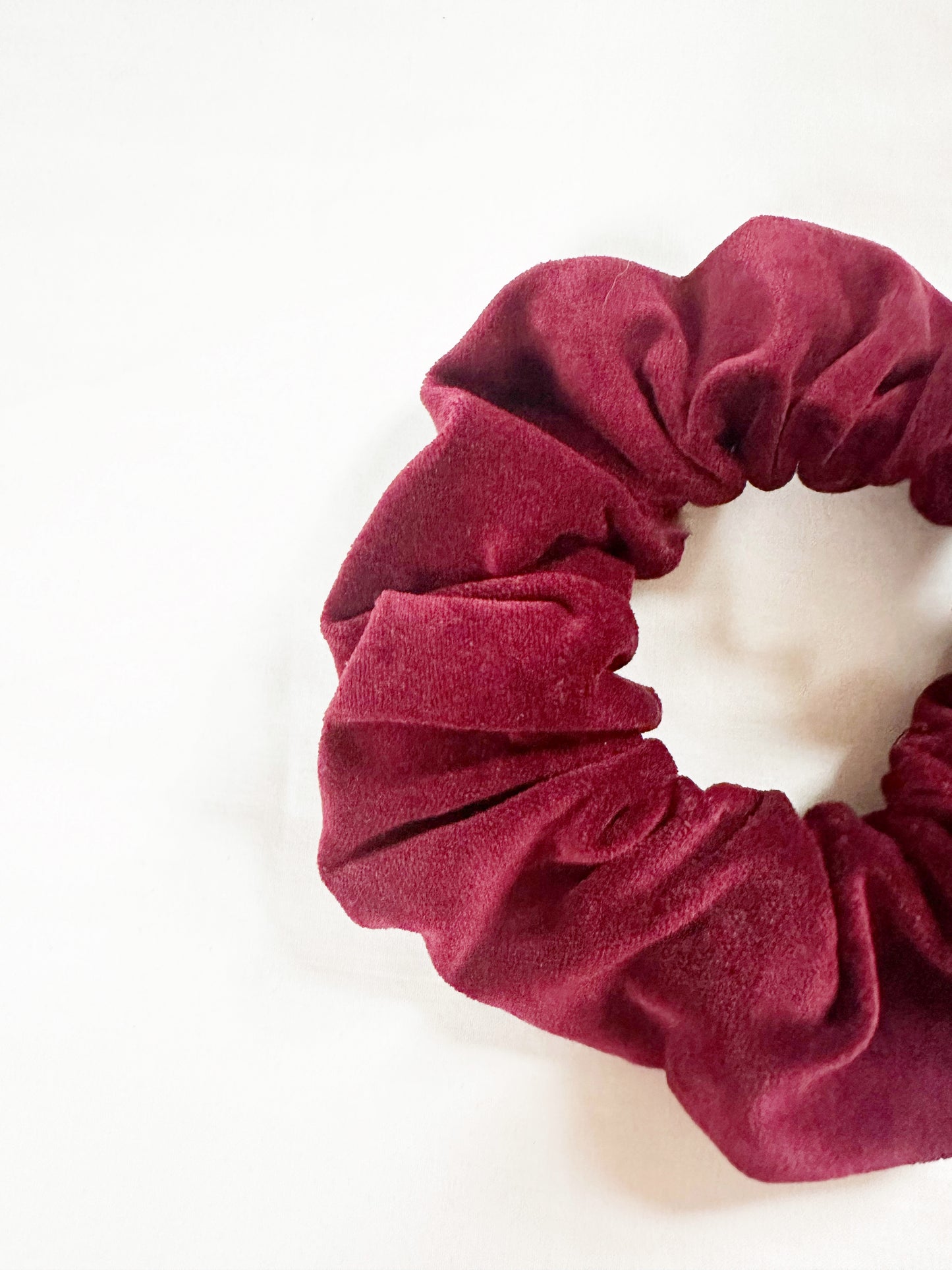 OG scrunchie in burgundy velvet