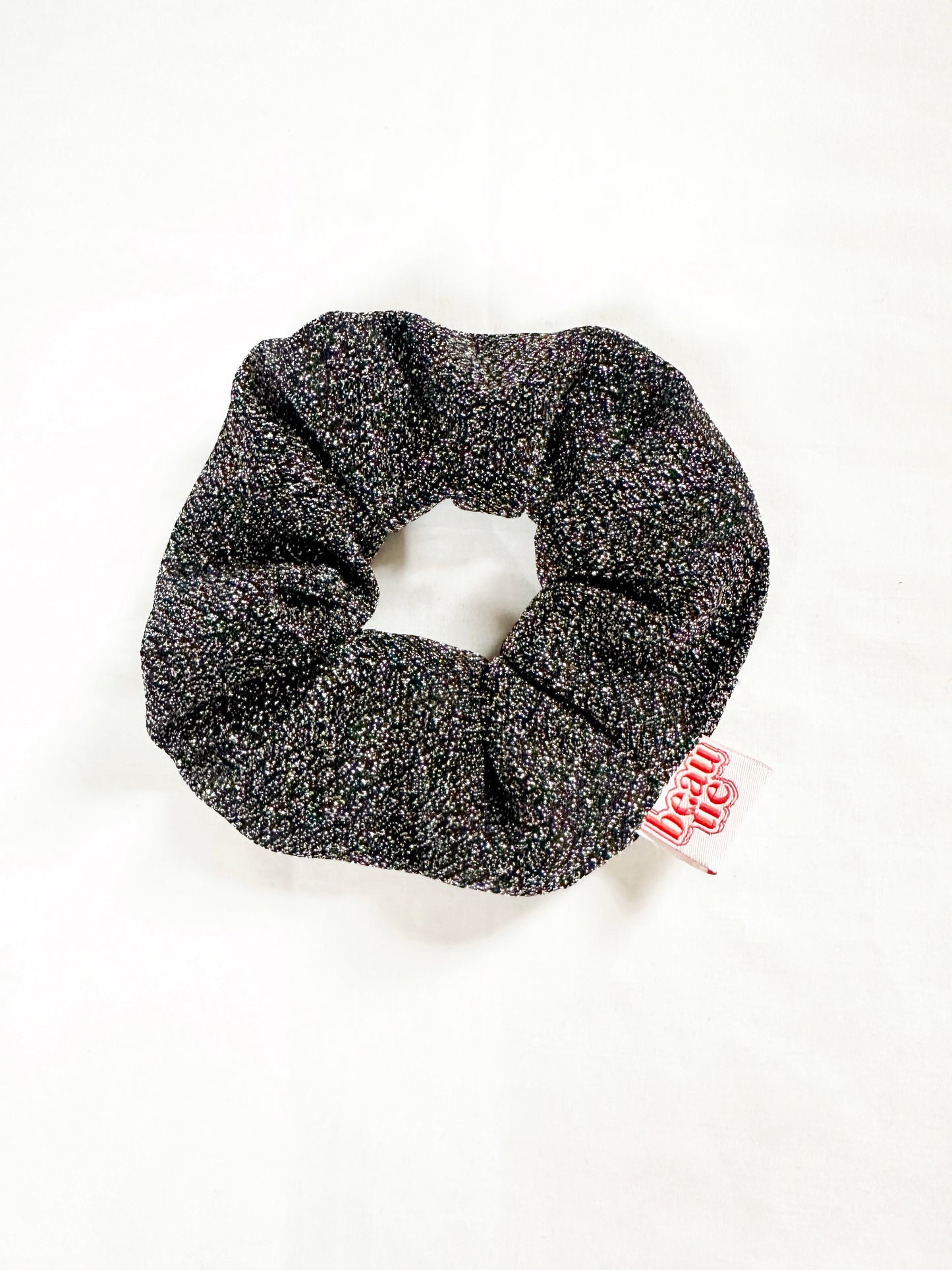 OG scrunchie in silver glitter