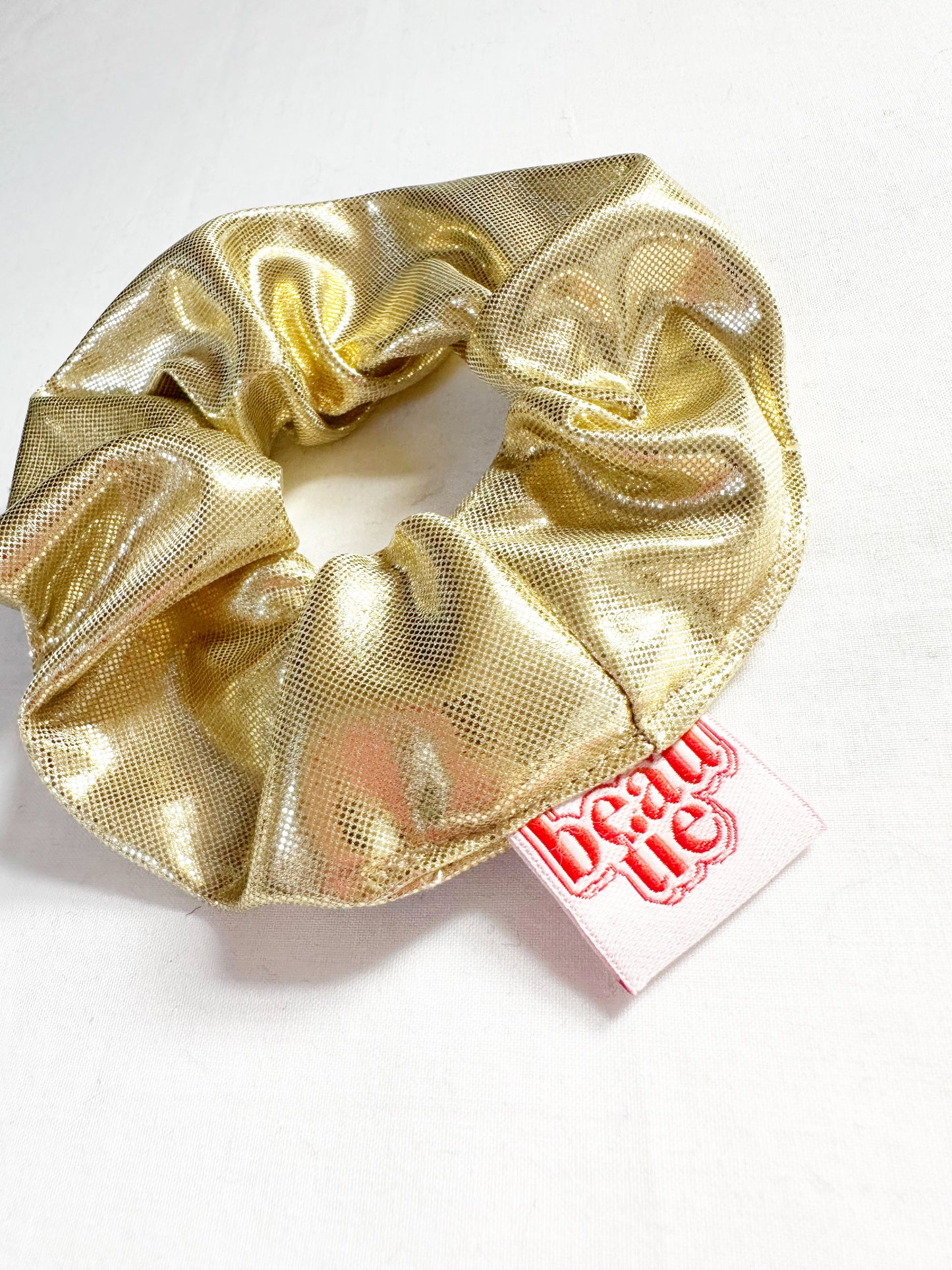 Mini scrunchie in gold lamé