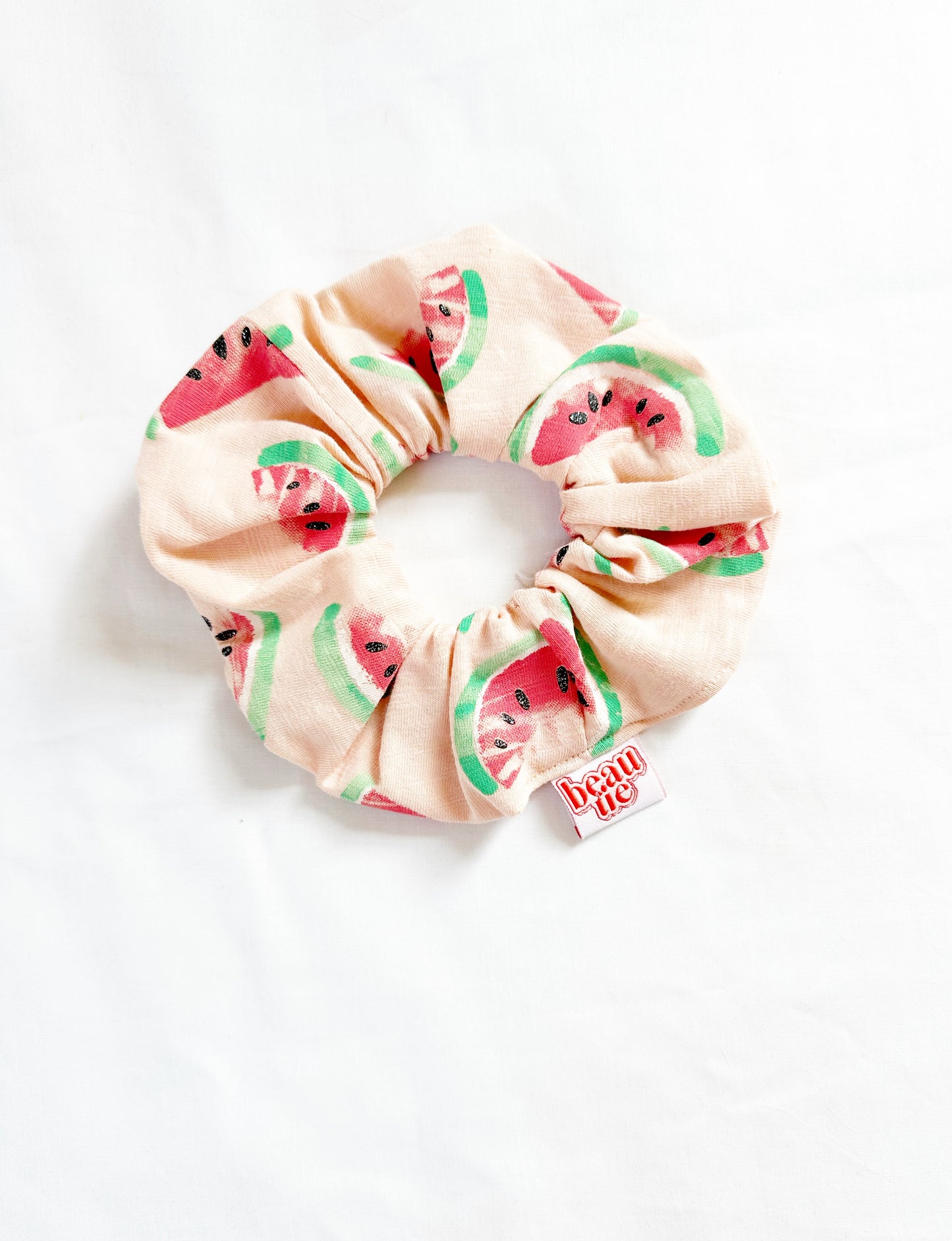 The OG scrunchie in sparkly watermelon