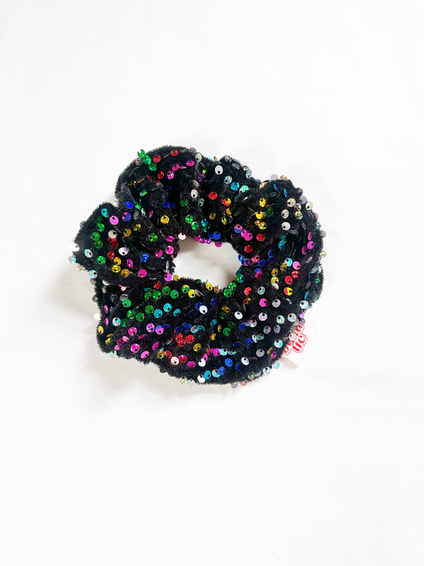 OG scrunchie in rainbow sequins