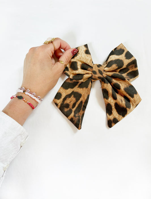 Beau hair bow in leopard print.