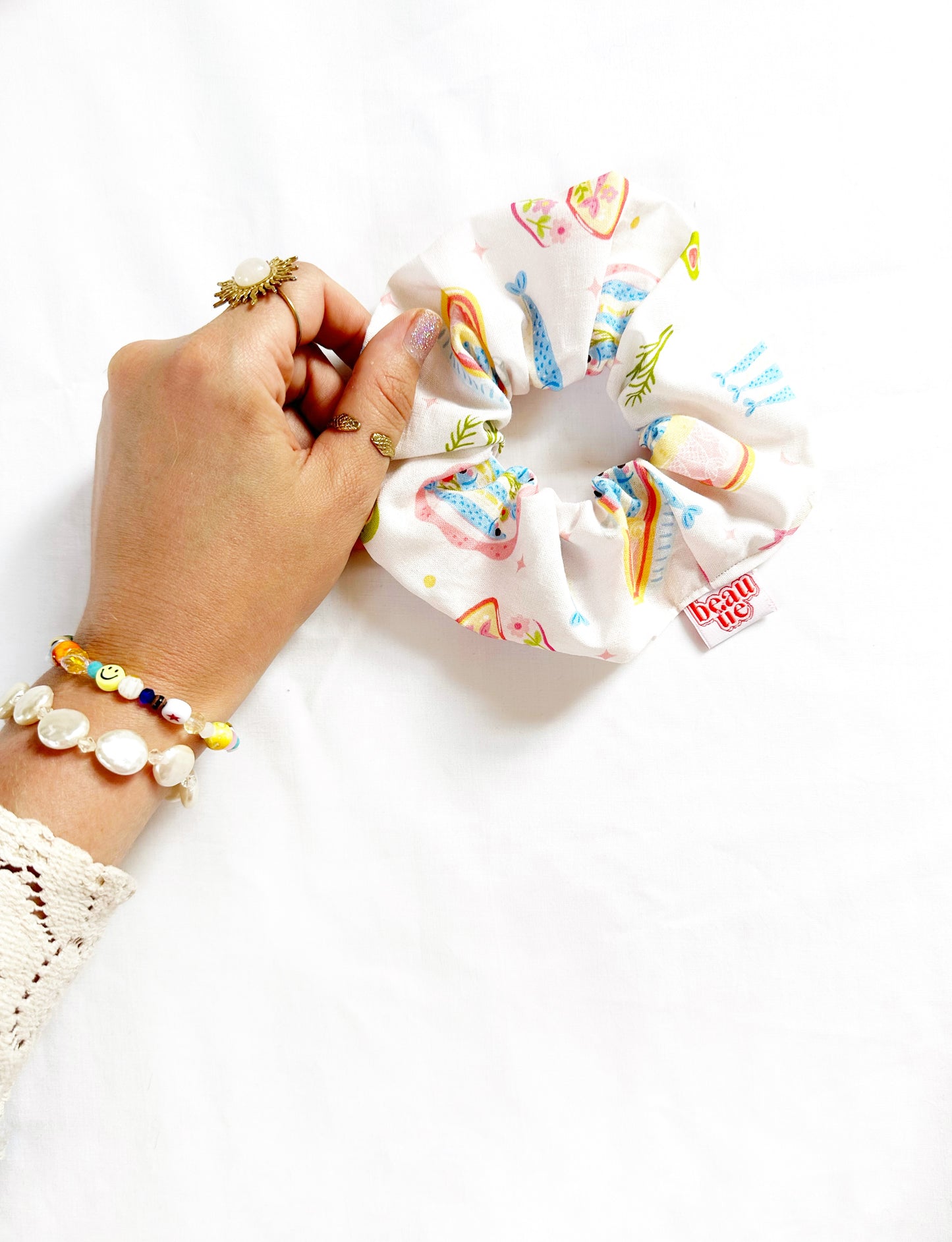 The OG scrunchie in pastel sardine
