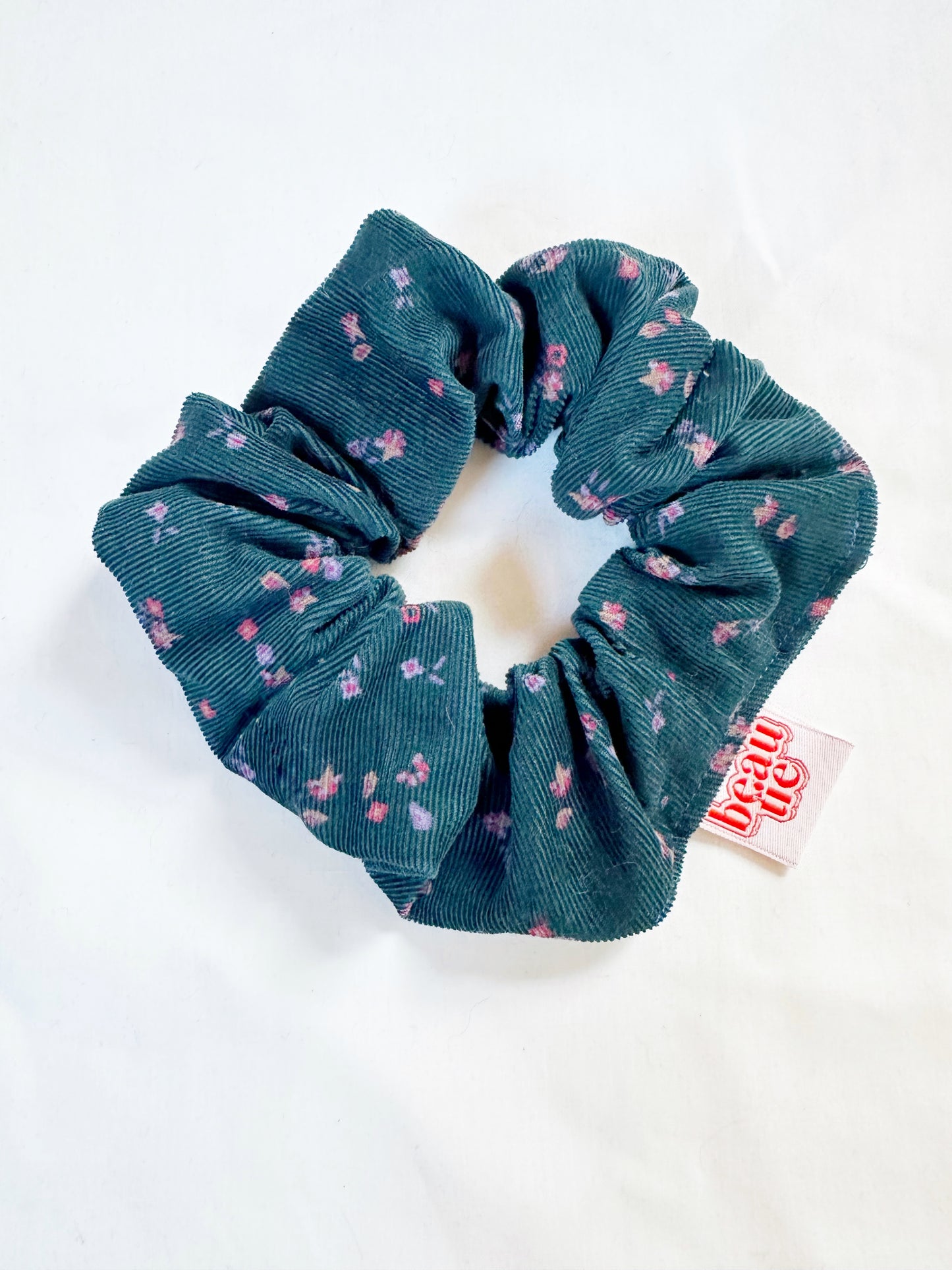 OG scrunchie in teal cord and pink floral