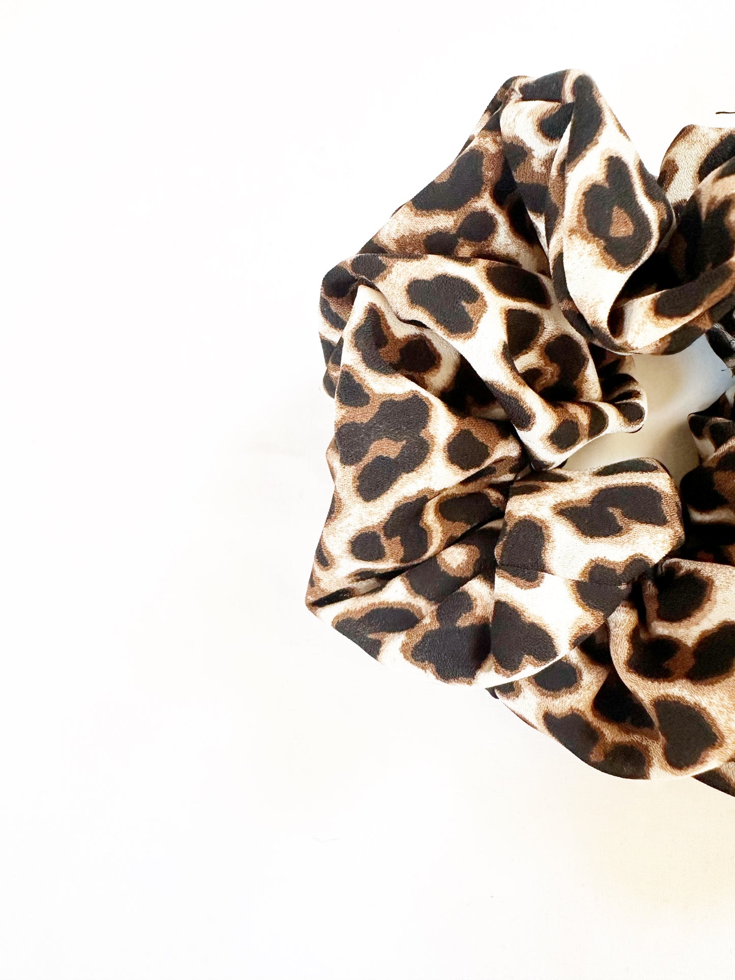 OG scrunchie in leopard ruffle