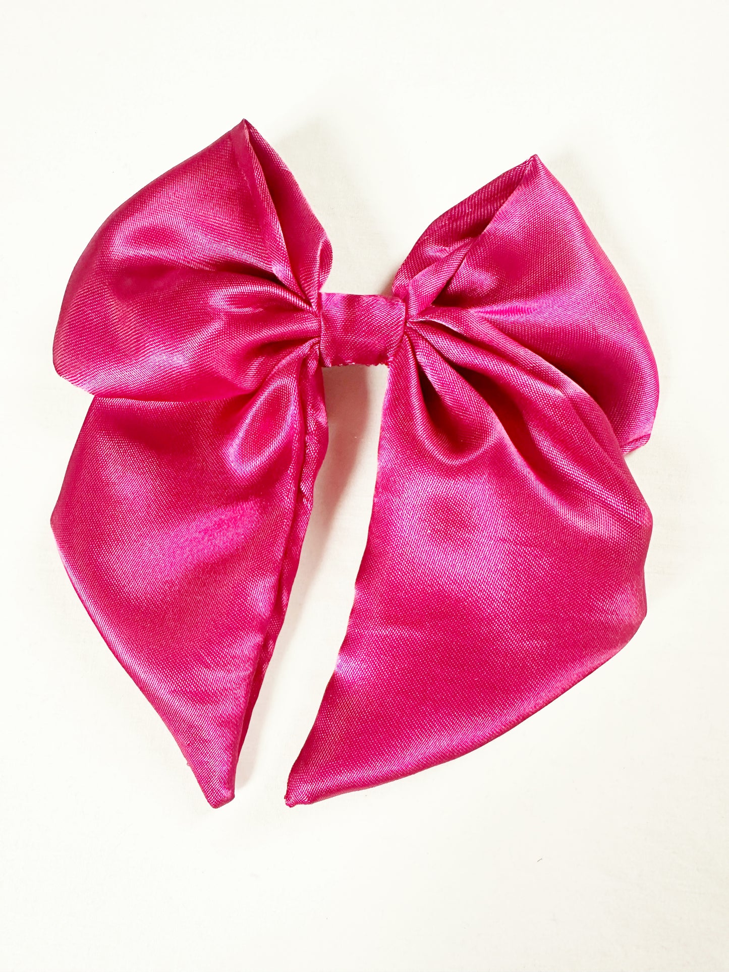 Beau hair bow in deep pink silk