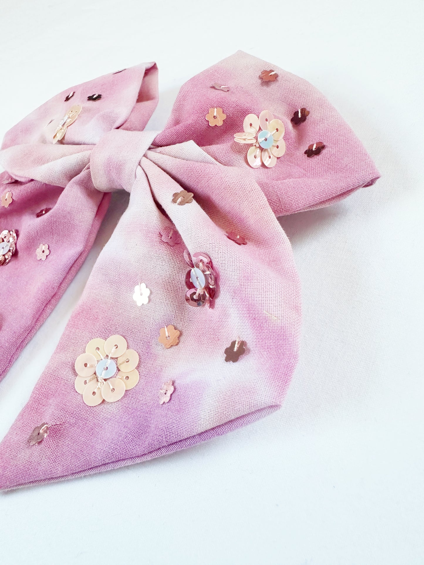 The Queen Bee - Hair Bow in pink tie dye with sequin flowers