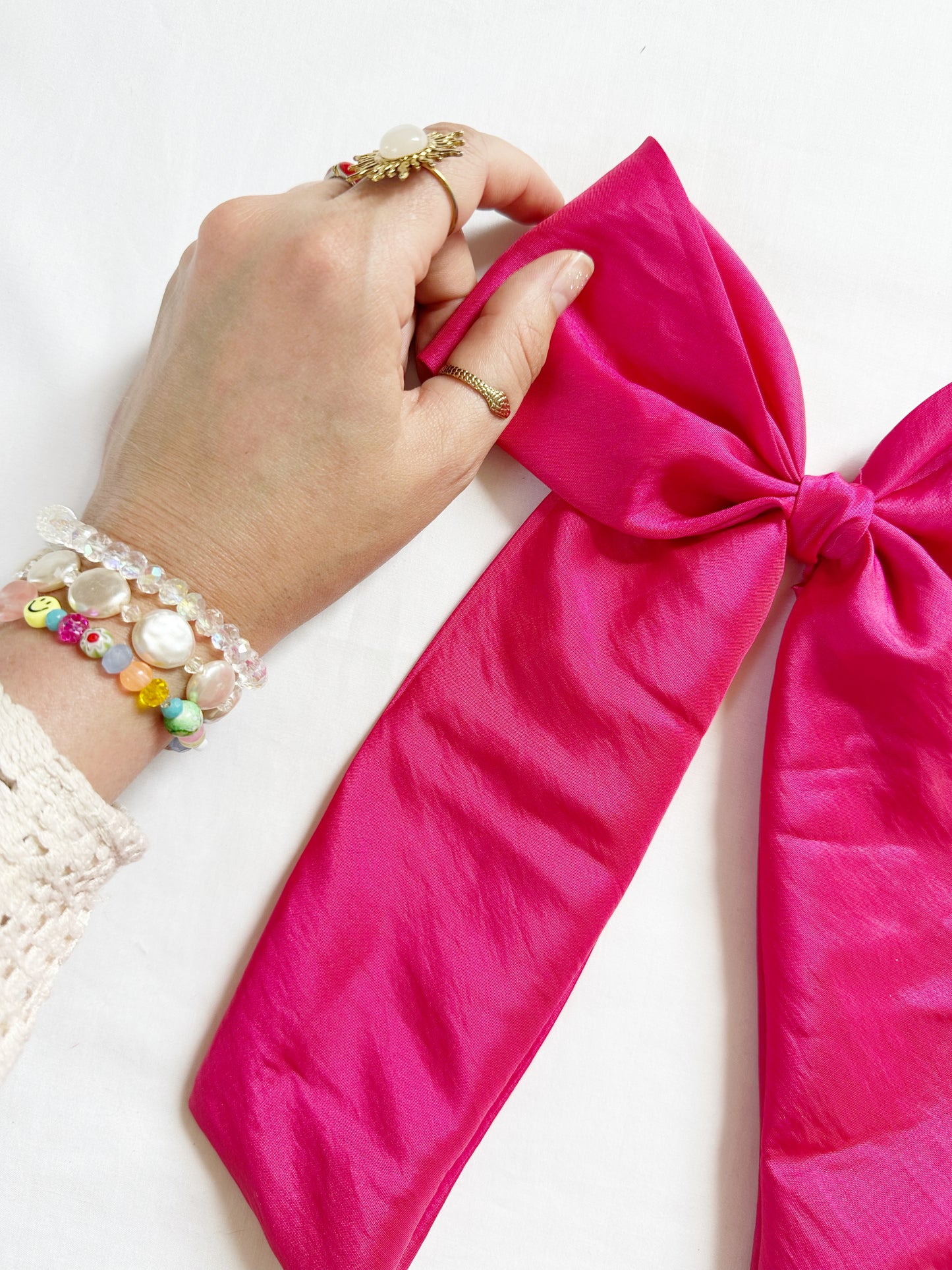 The Power Hair Bow in hot pink silk