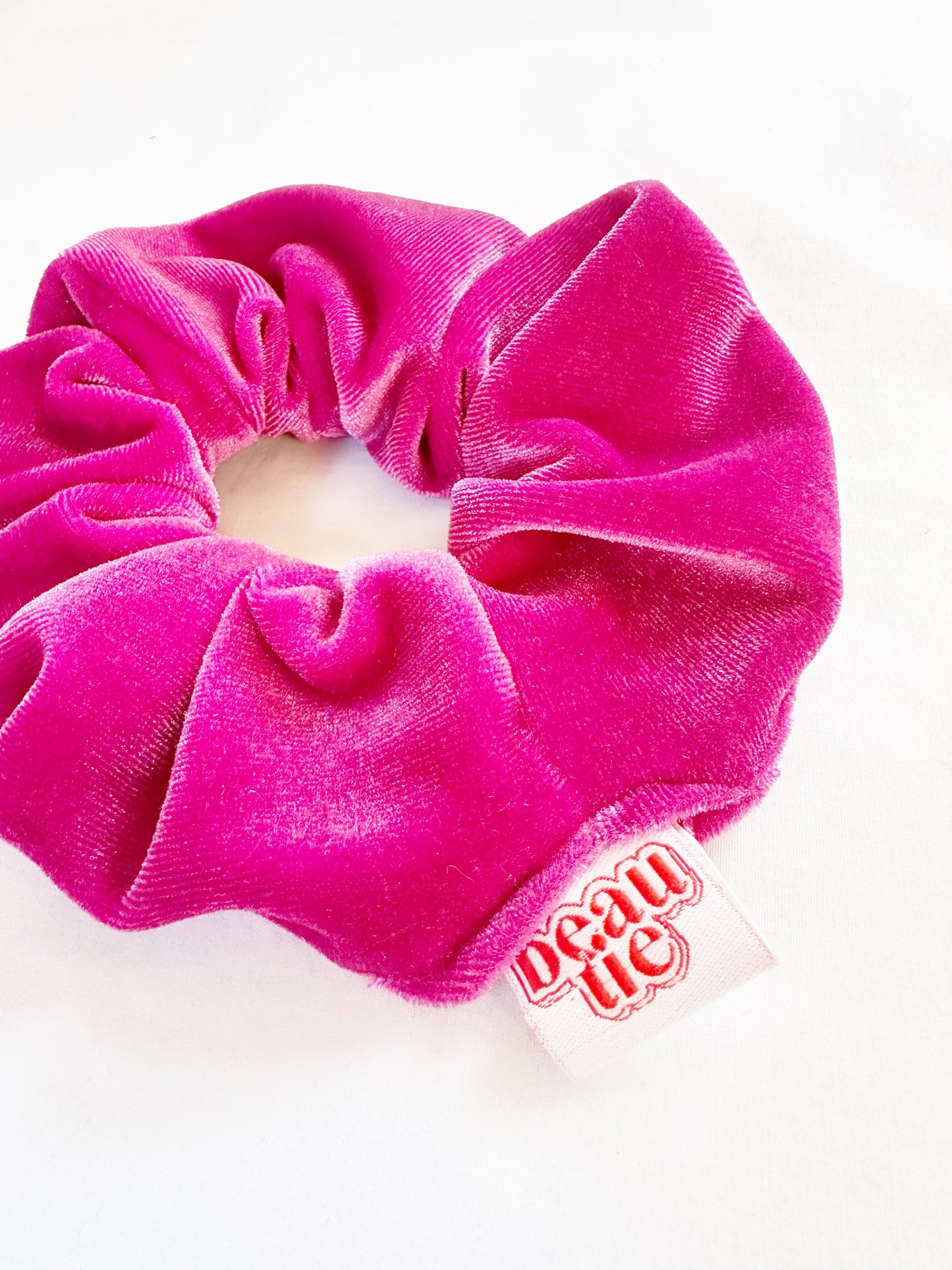 OG scrunchie in hot pink velour velvet