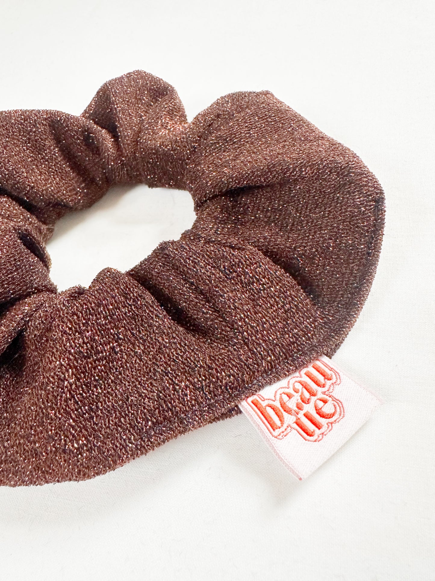 OG scrunchie in brown glitter