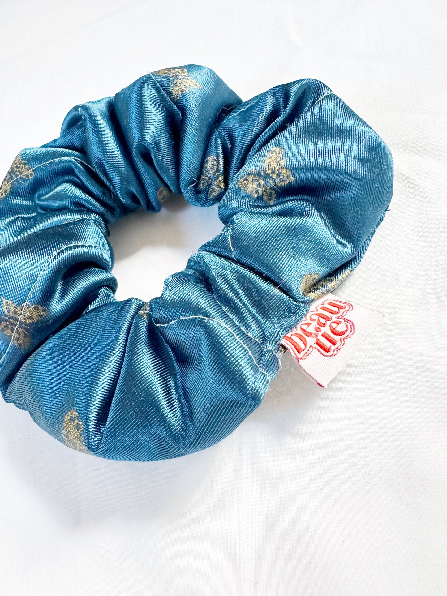 OG scrunchie in teal quilted silk