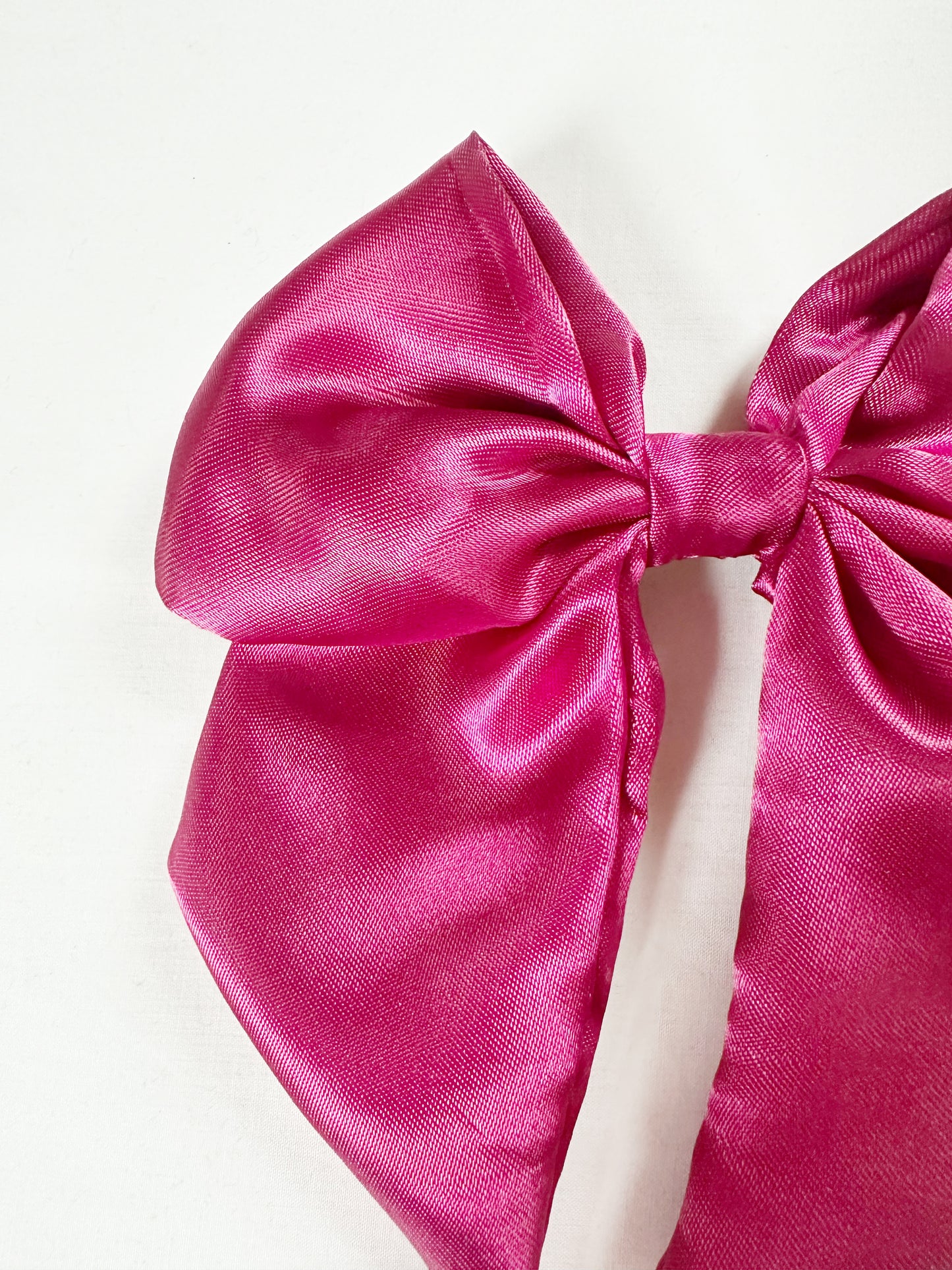 Beau hair bow in deep pink silk