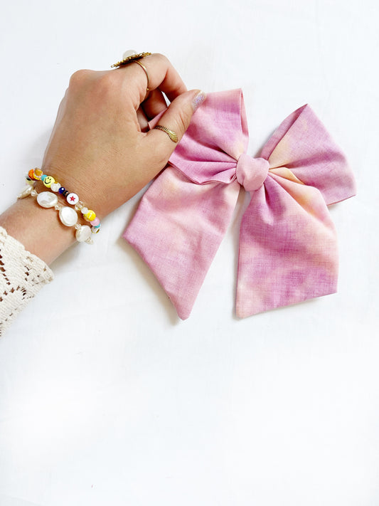 Beau hair bow in sunset tie dye cotton