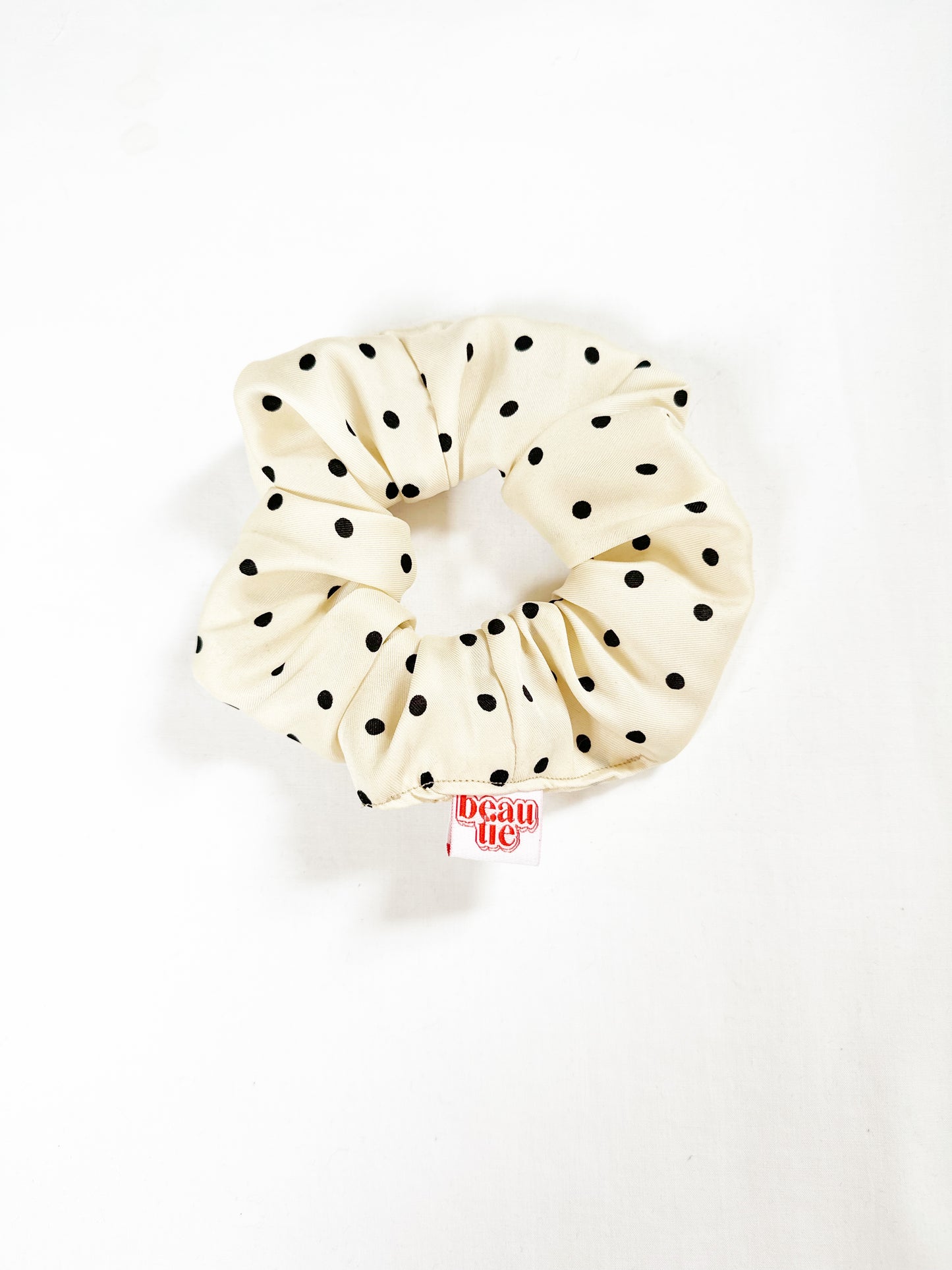 OG scrunchie in cream polka dot