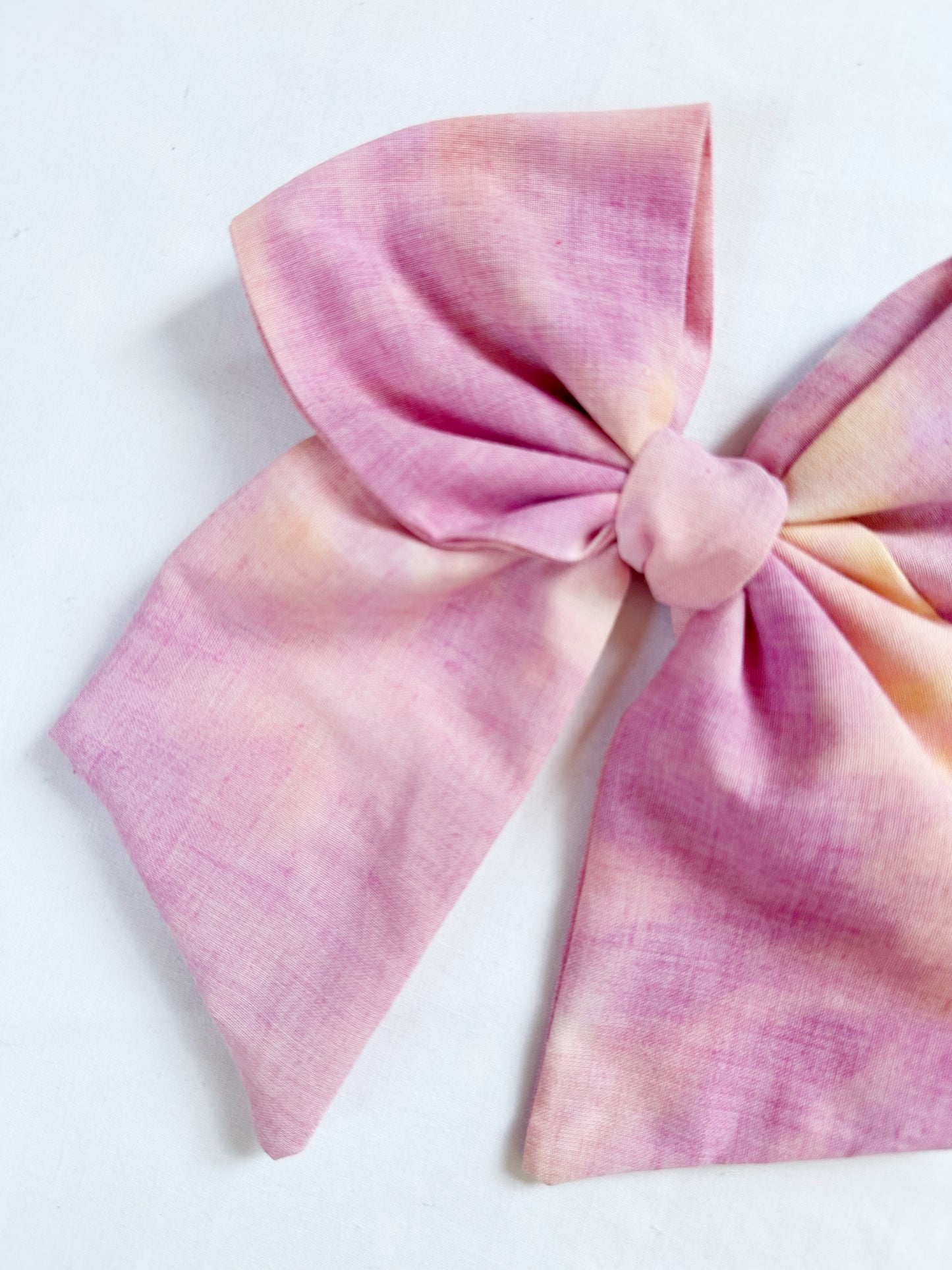Beau hair bow in sunset tie dye cotton