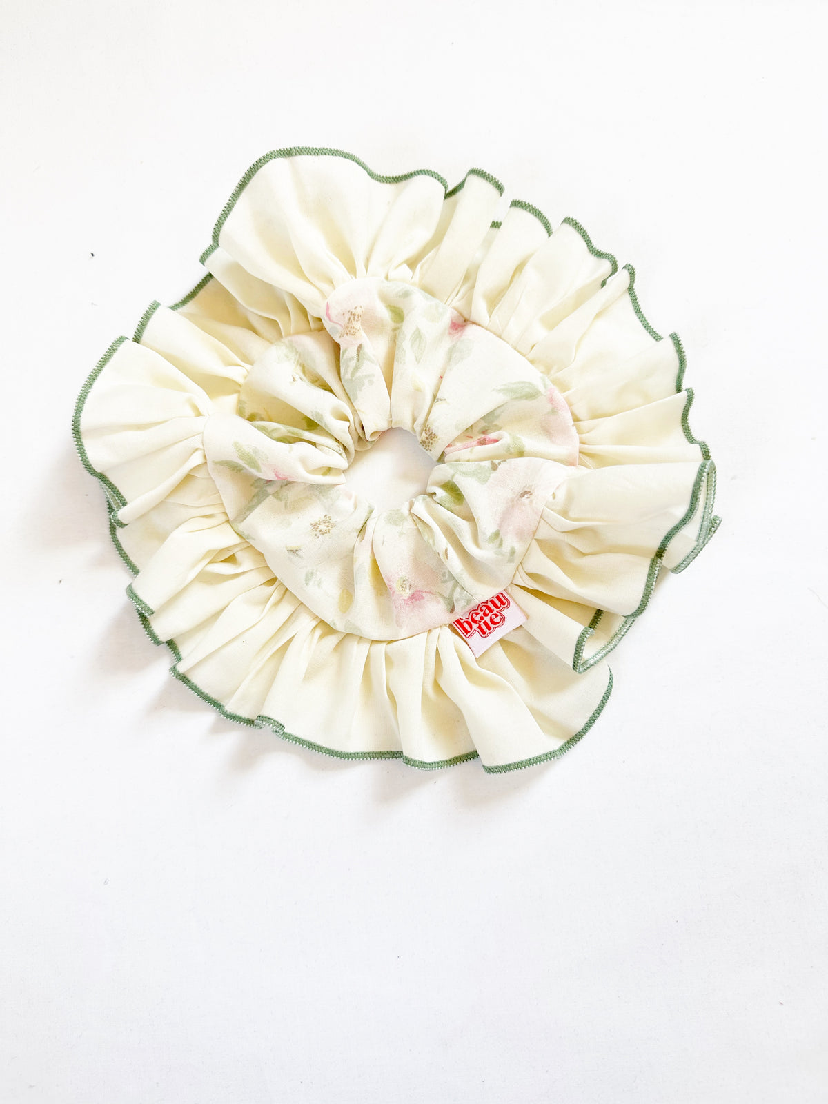 Frilly scrunchie in green floral