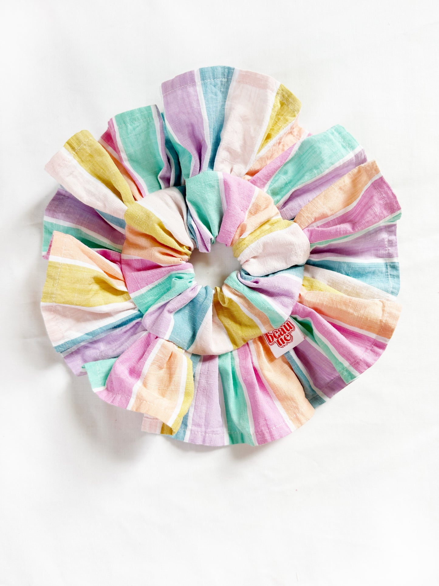 Frilly scrunchie in pastel stripe