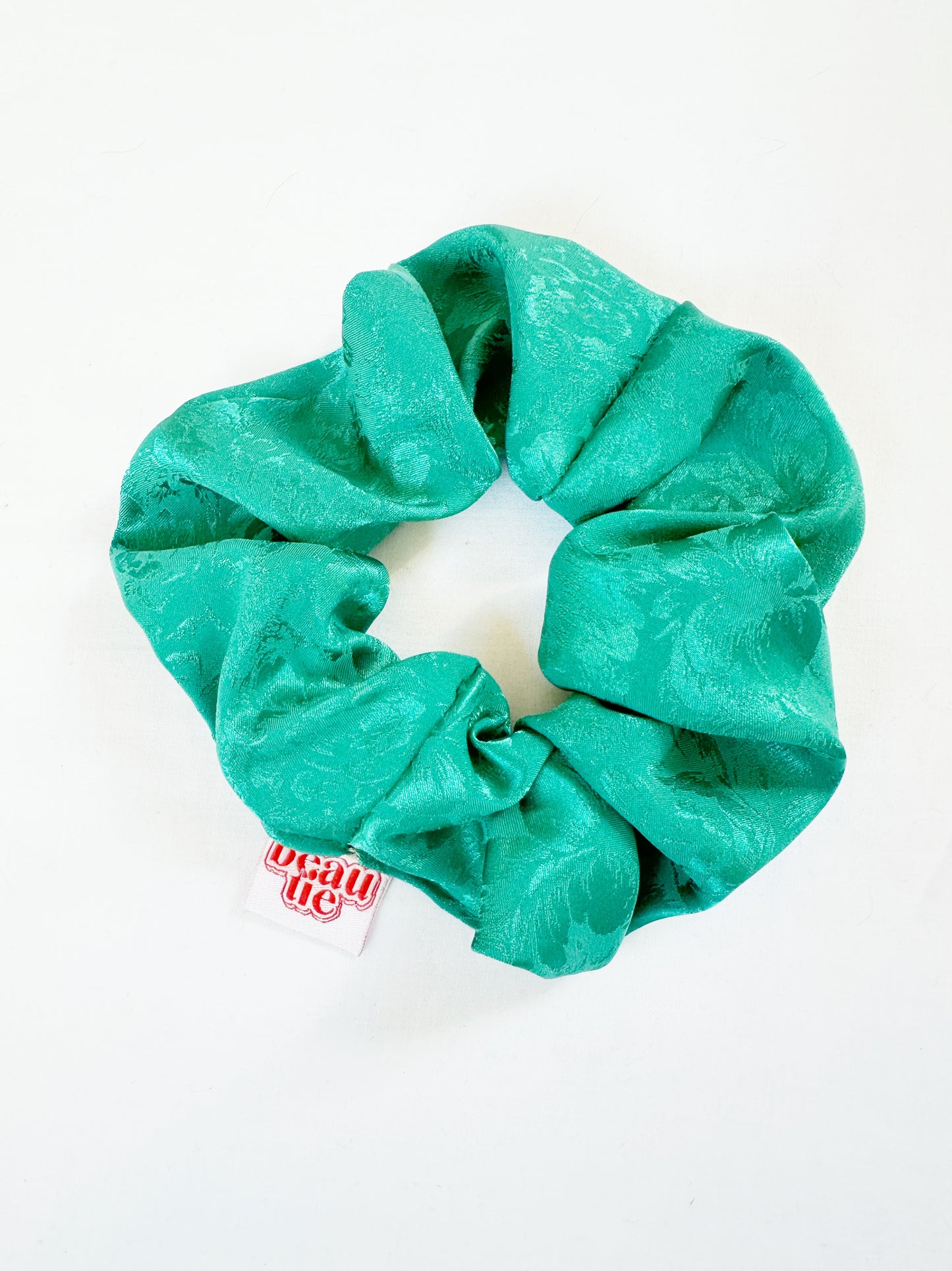 OG scrunchie in turquoise silky floral