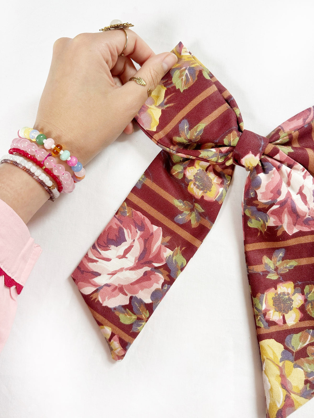 The Power Hair Bow in burgundy vintage floral