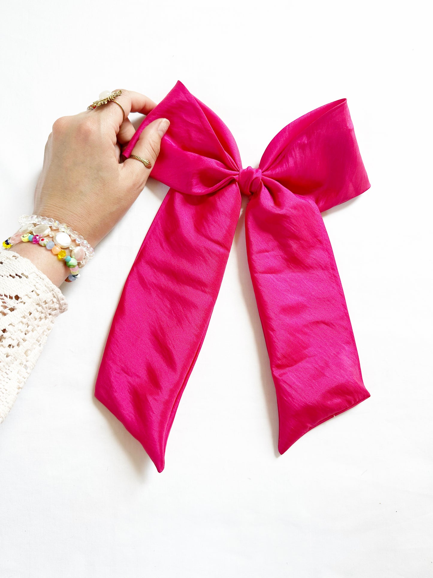 The Power Hair Bow in hot pink silk