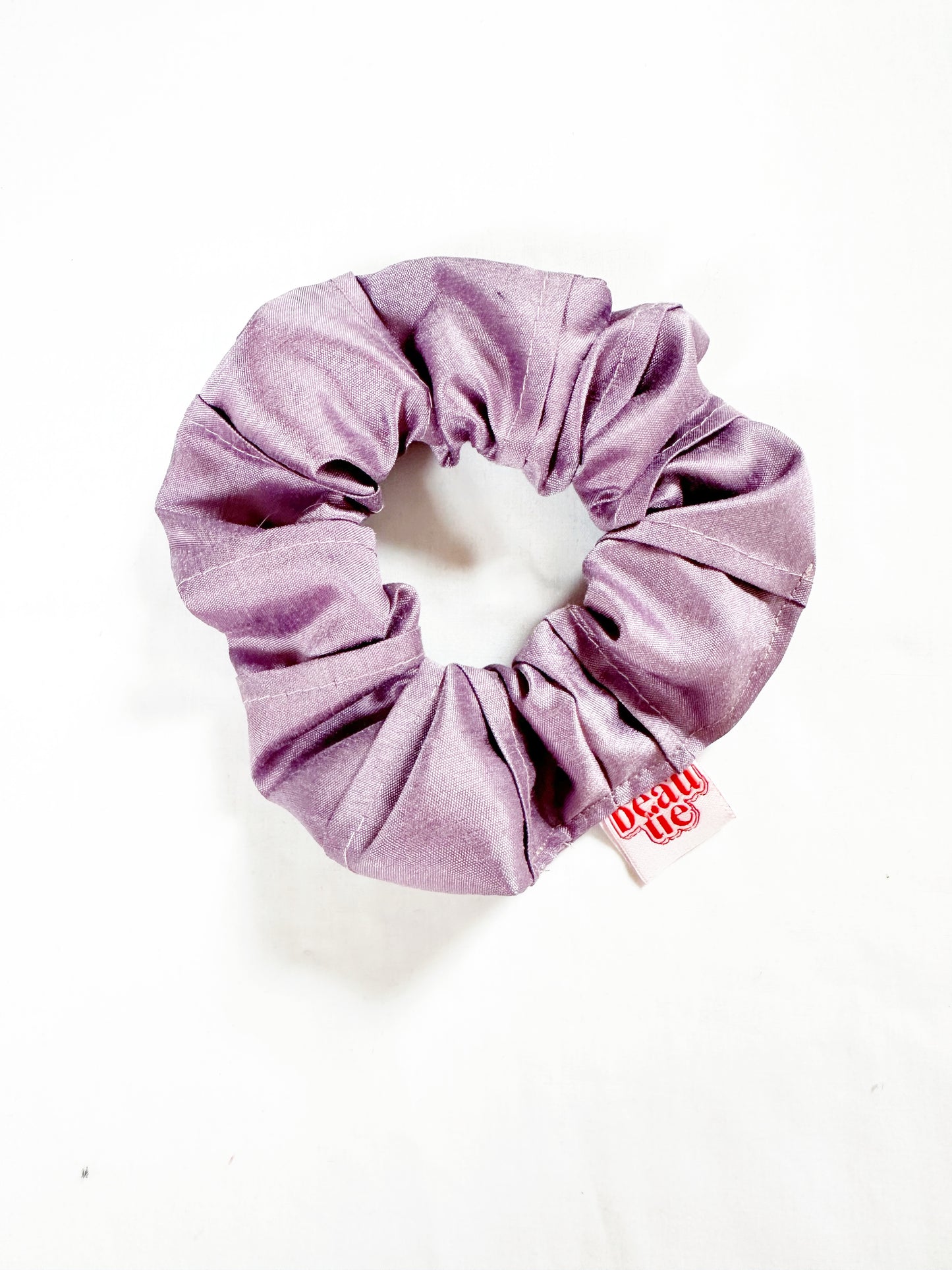 OG scrunchie in pleated lilac silk