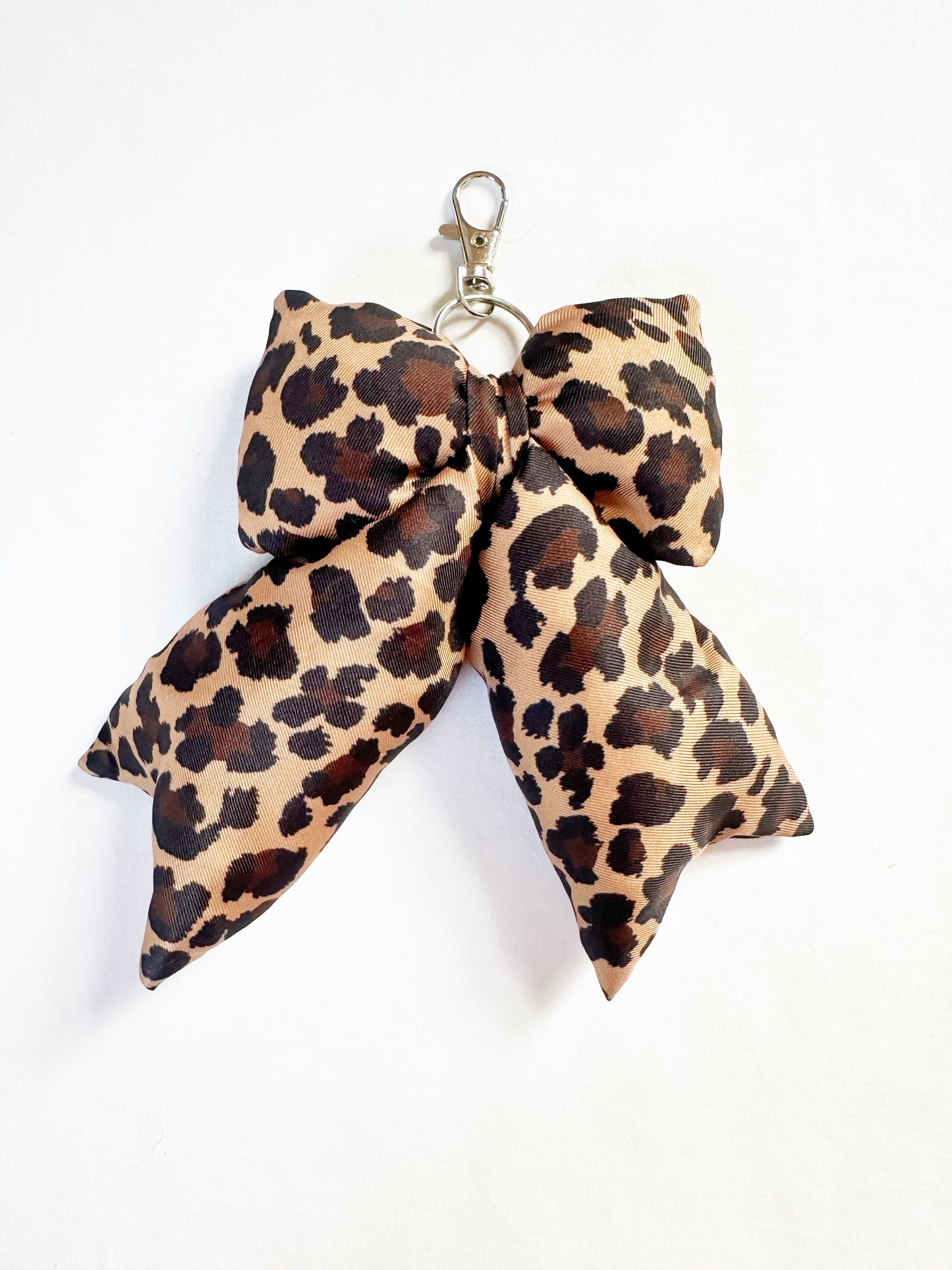 Puffy bow bag charm in leopard print