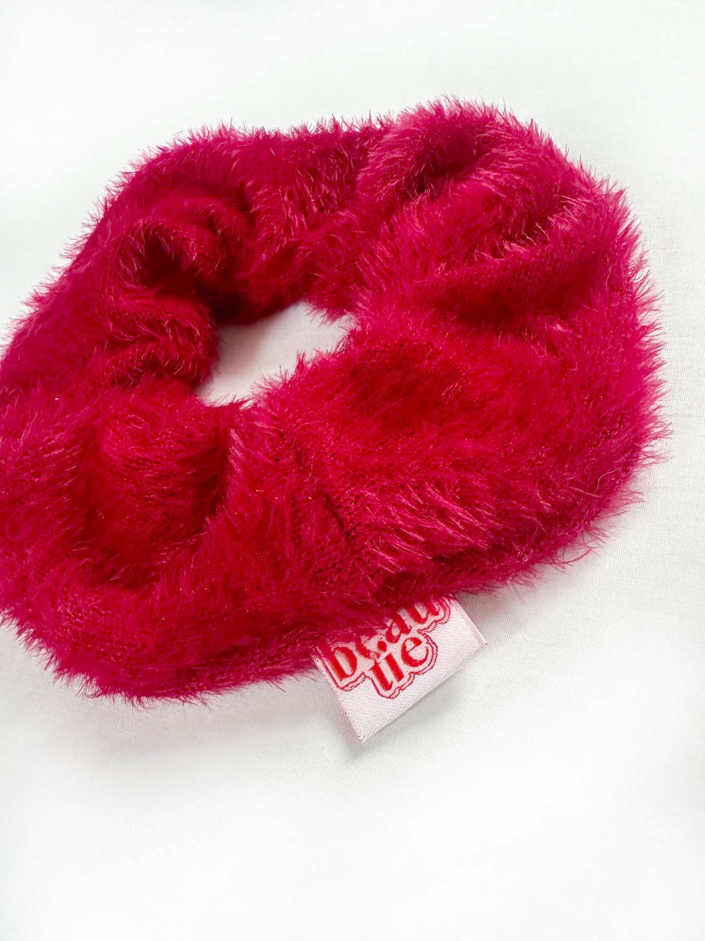 OG scrunchie in red fluff