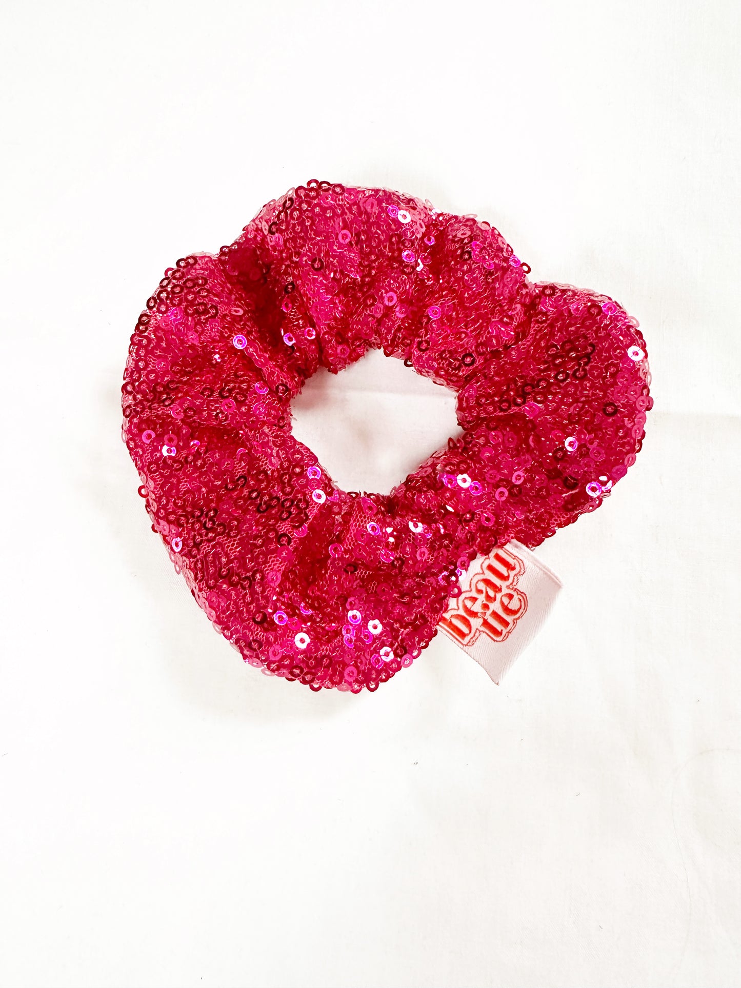 Mini scrunchie in hot pink sequin