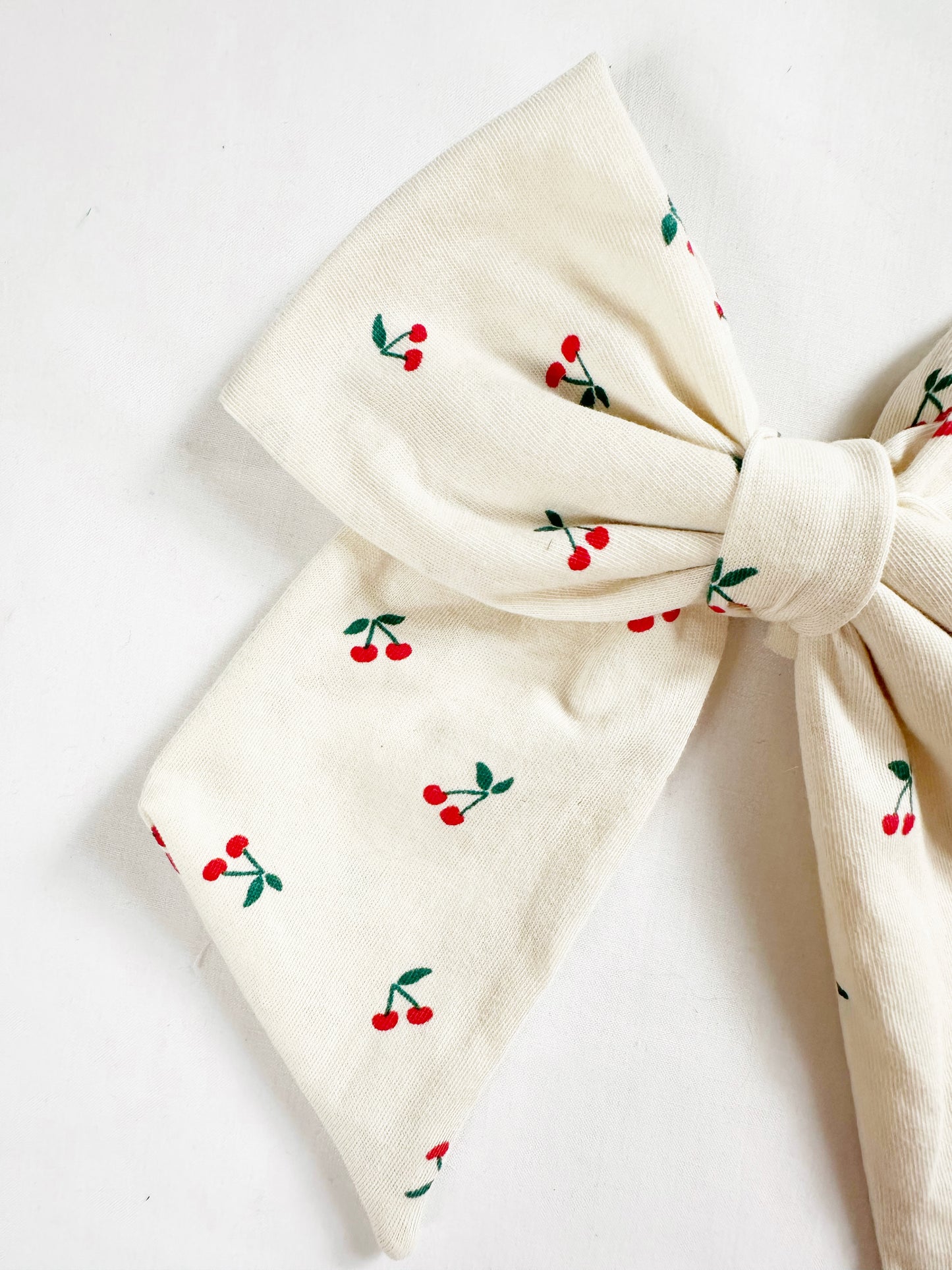 Beau hair bow in cherry print