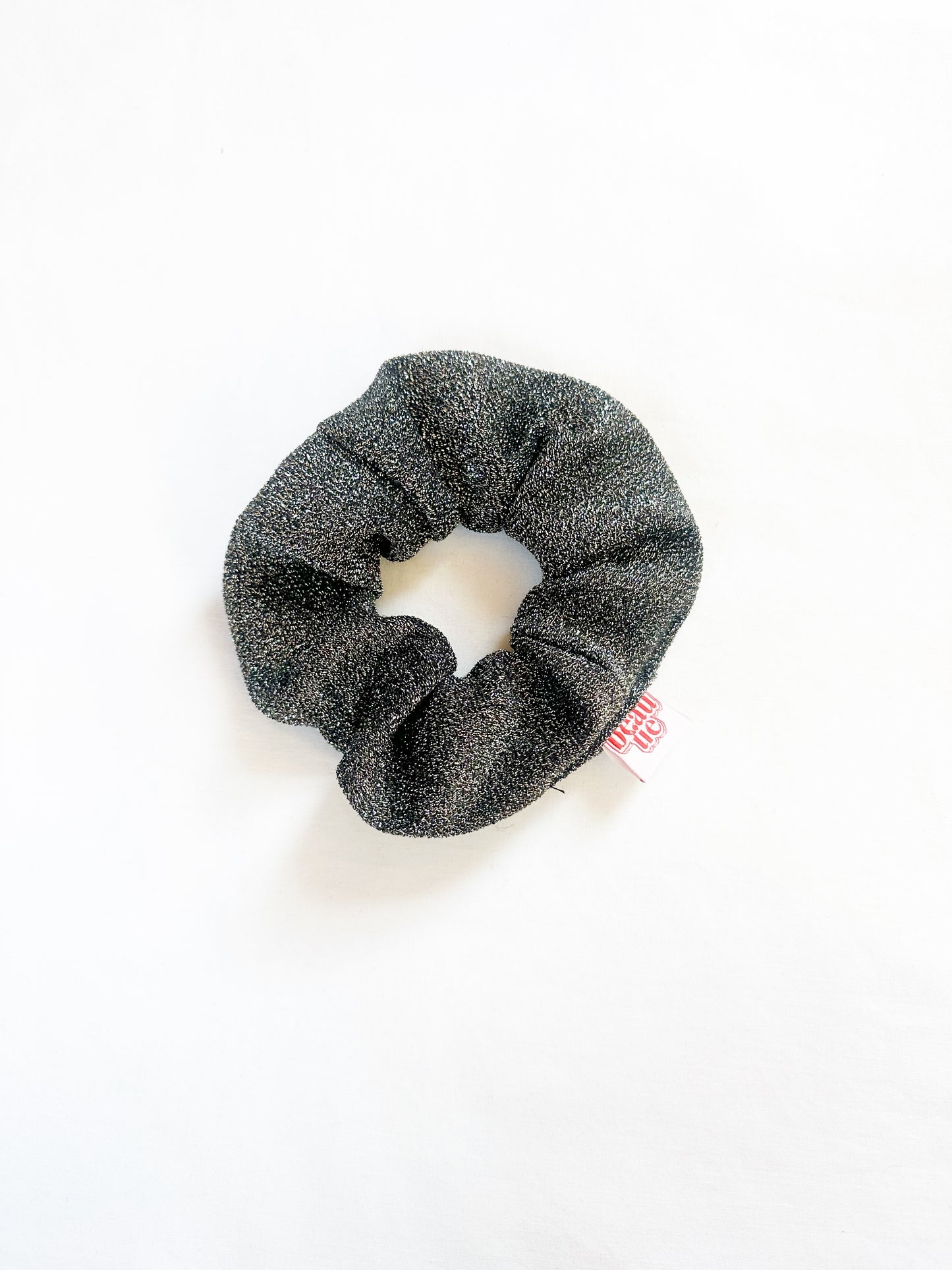 OG scrunchie in silver glitter