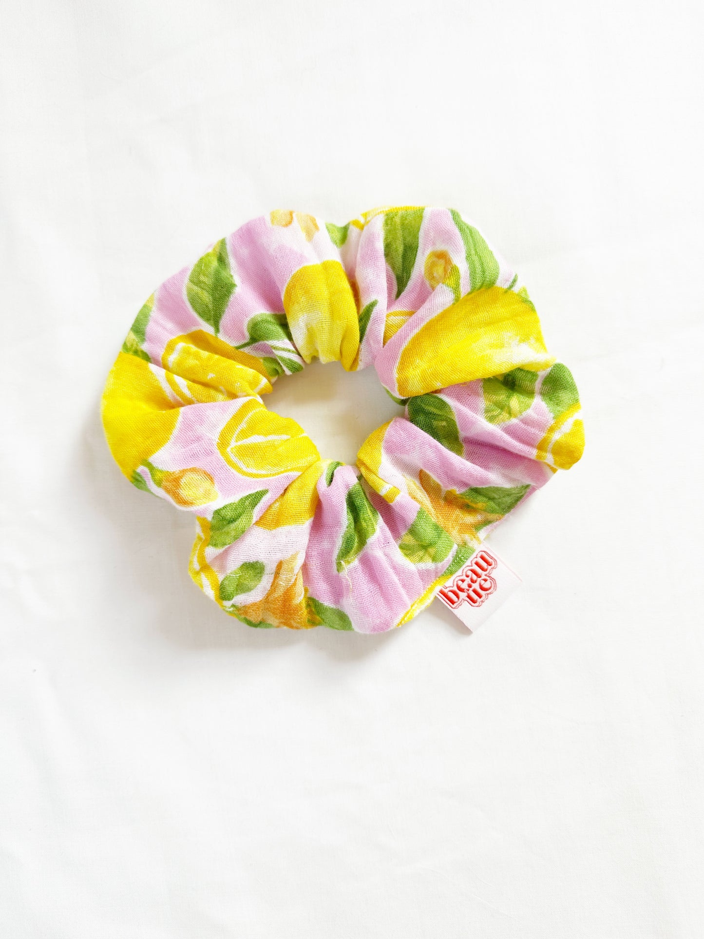 The OG scrunchie in leafy lemon
